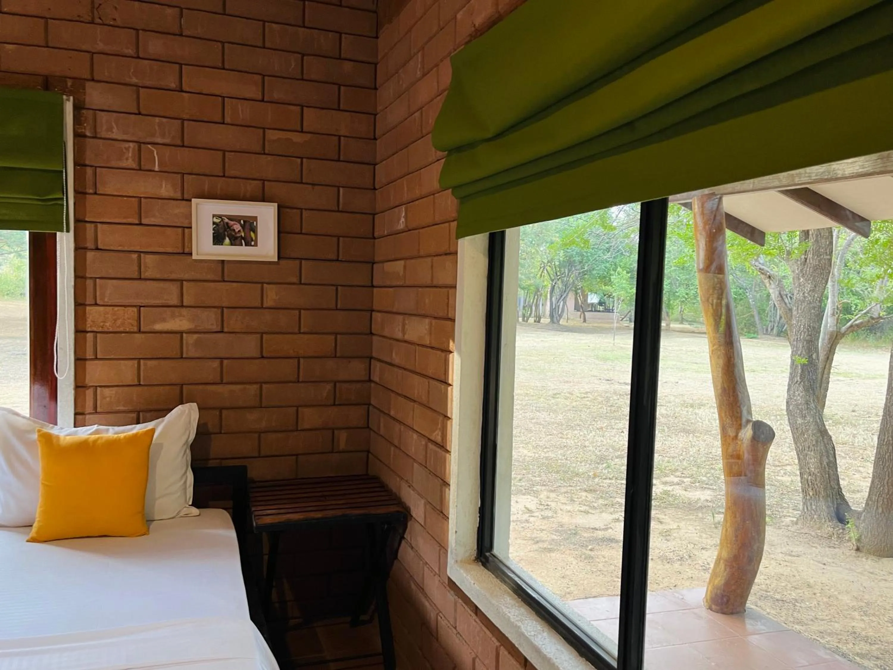 Garden view, Bed in Funky Leopard Safari Lodge Bordering Yala National Park