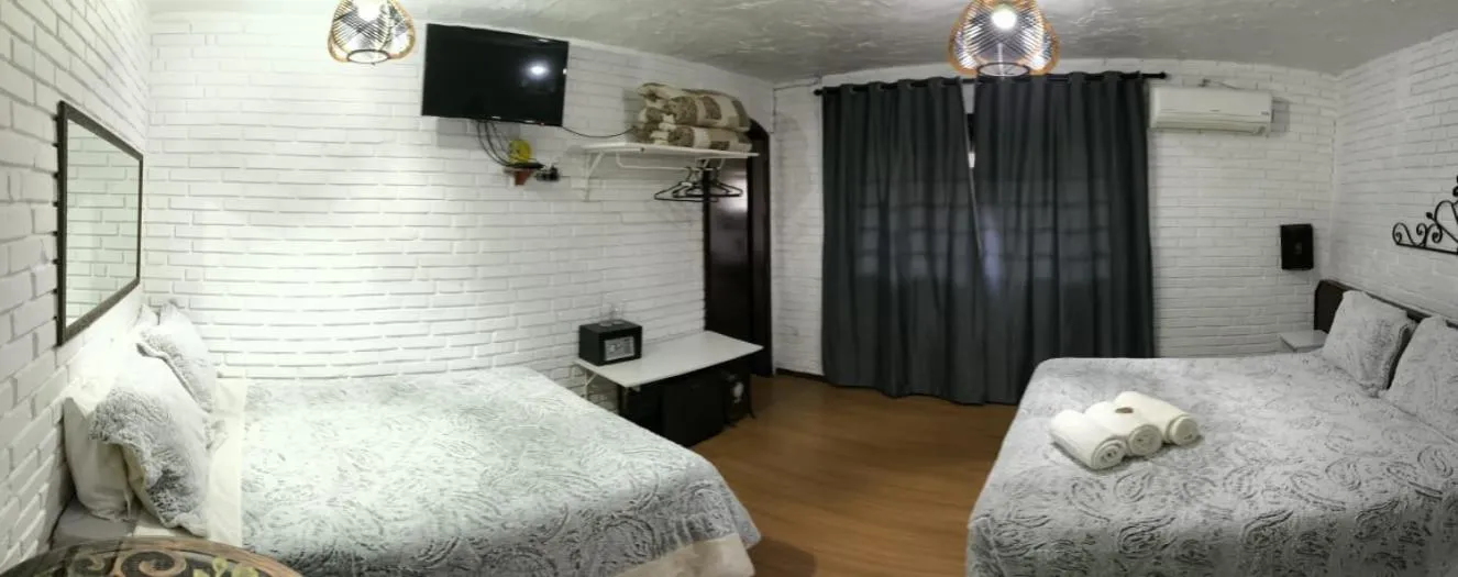 Bed in Pousada casa da Colina