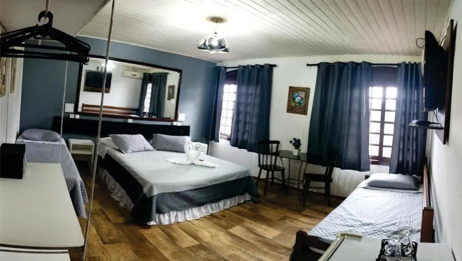 Bed in Pousada casa da Colina