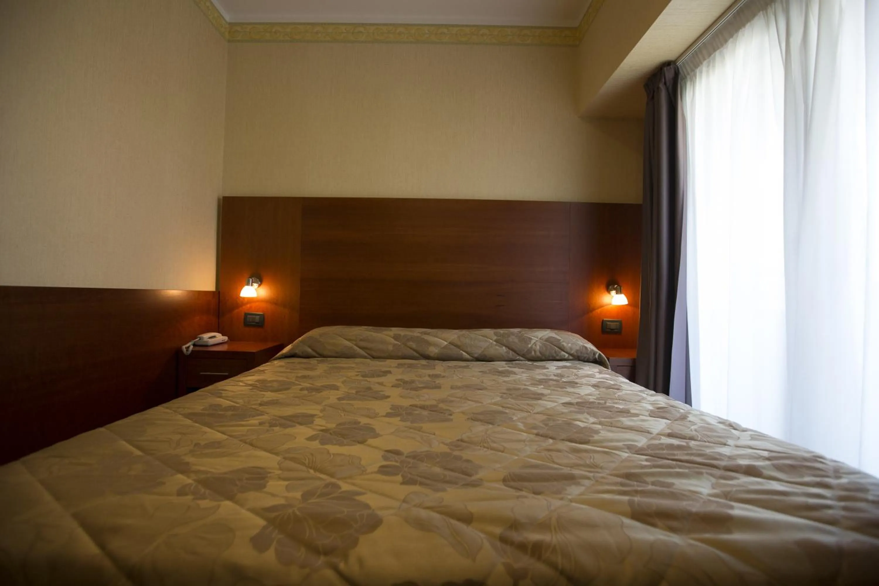 Bed in Hotel Metropole