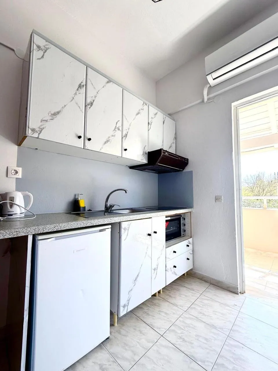 Kitchen or kitchenette in Marina Studios