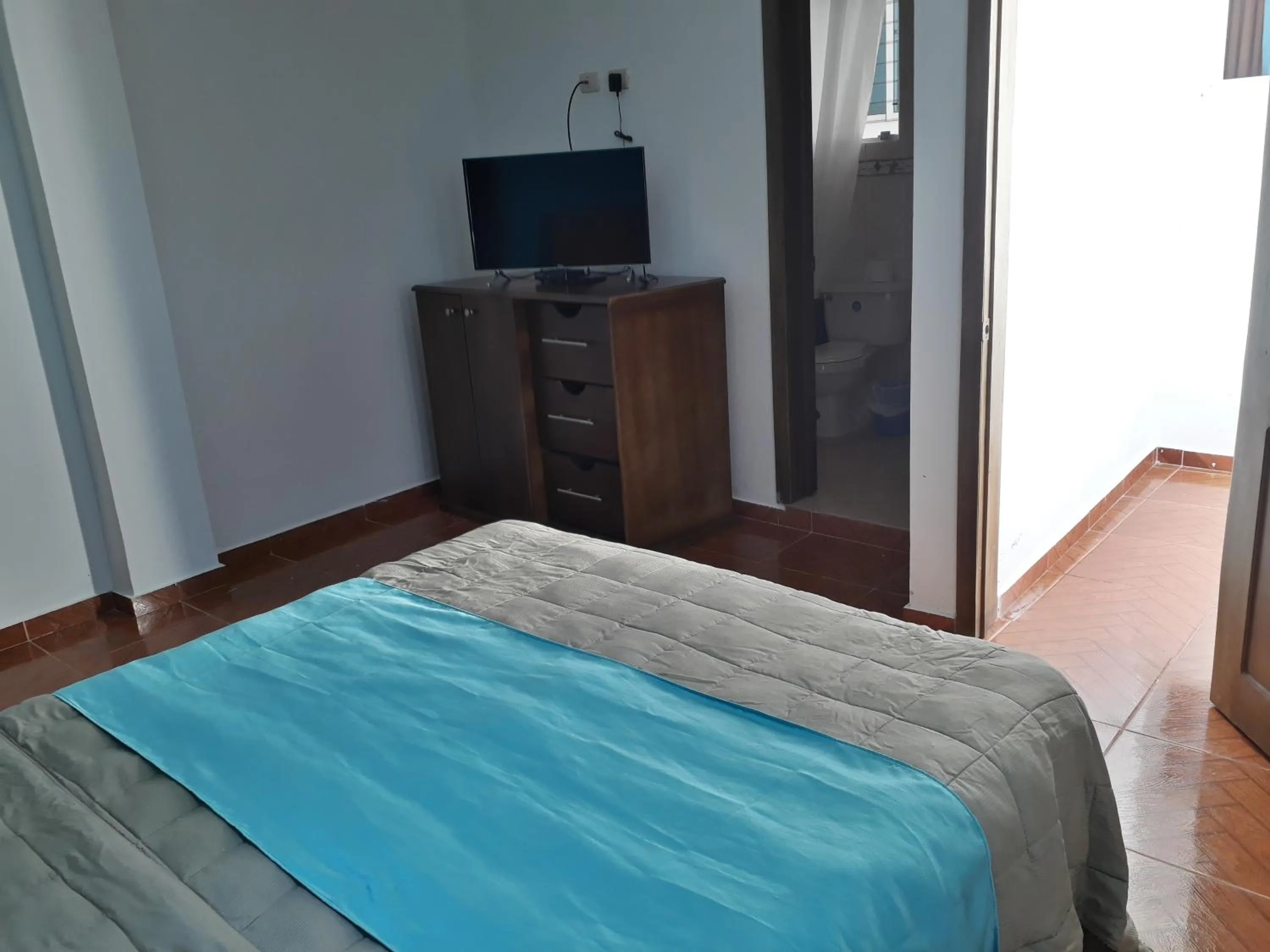 Bed in Figaro Hotel Samana