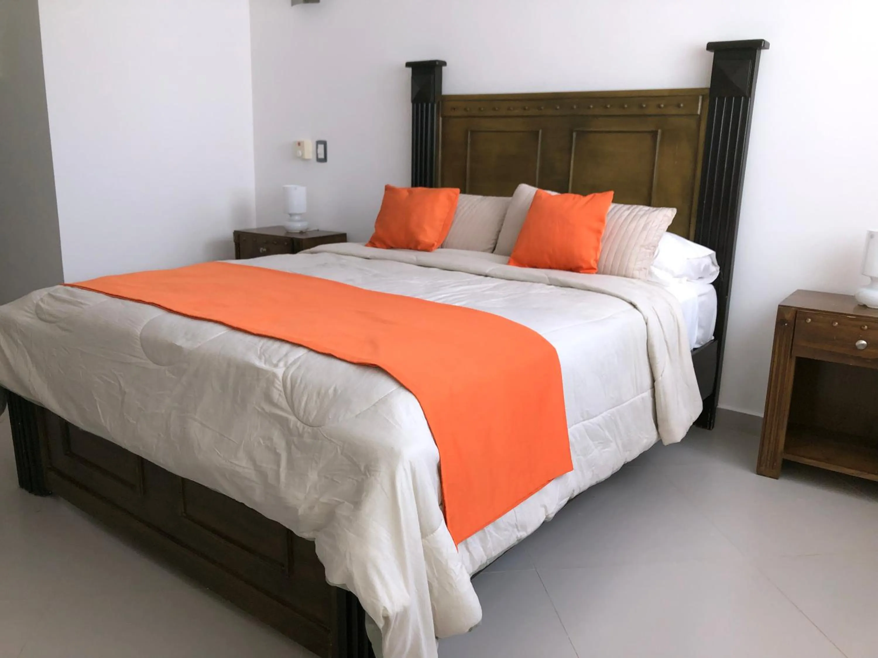 Bed in Figaro Hotel Samana