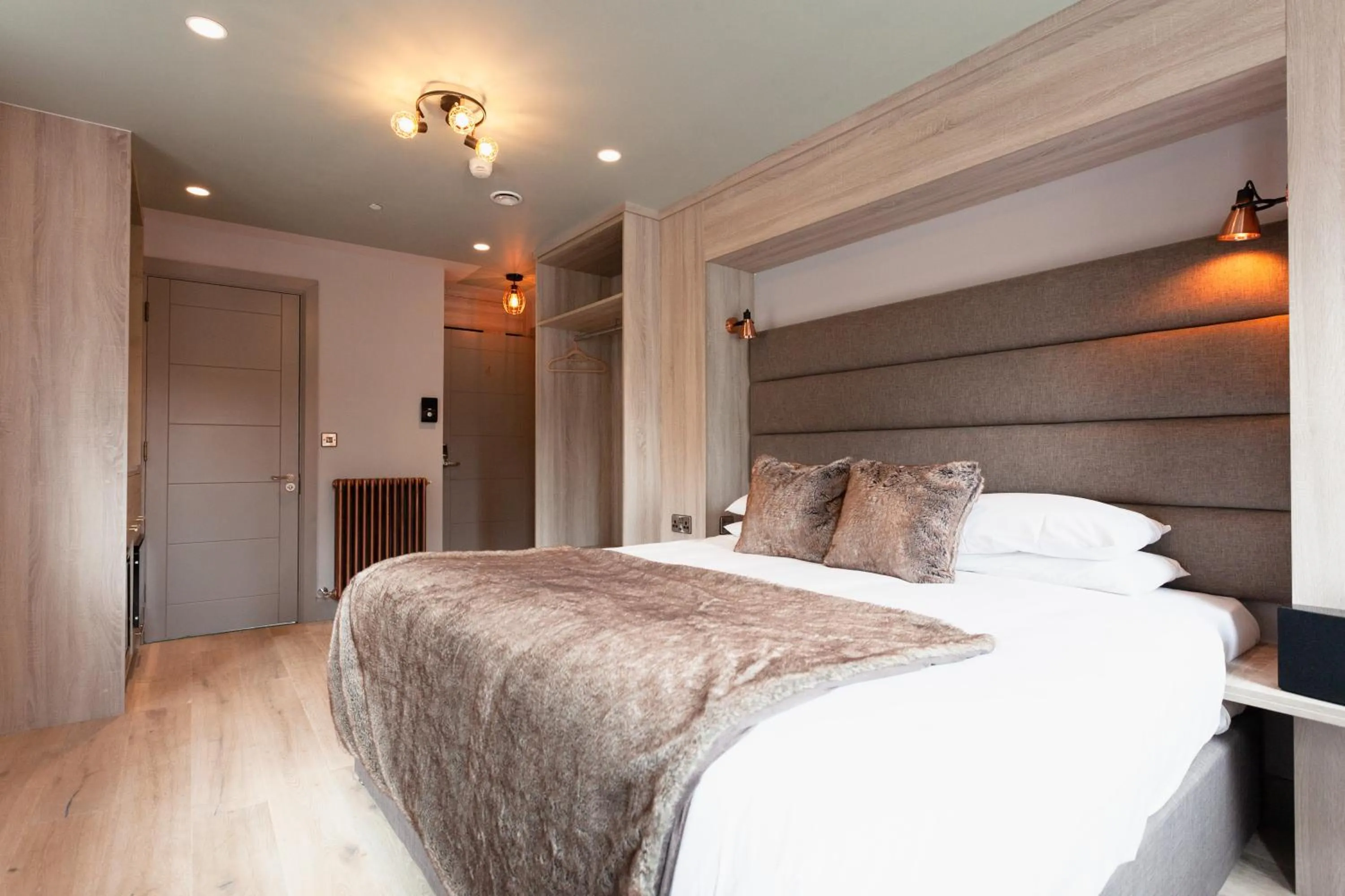 Bed in Clarendon Suites