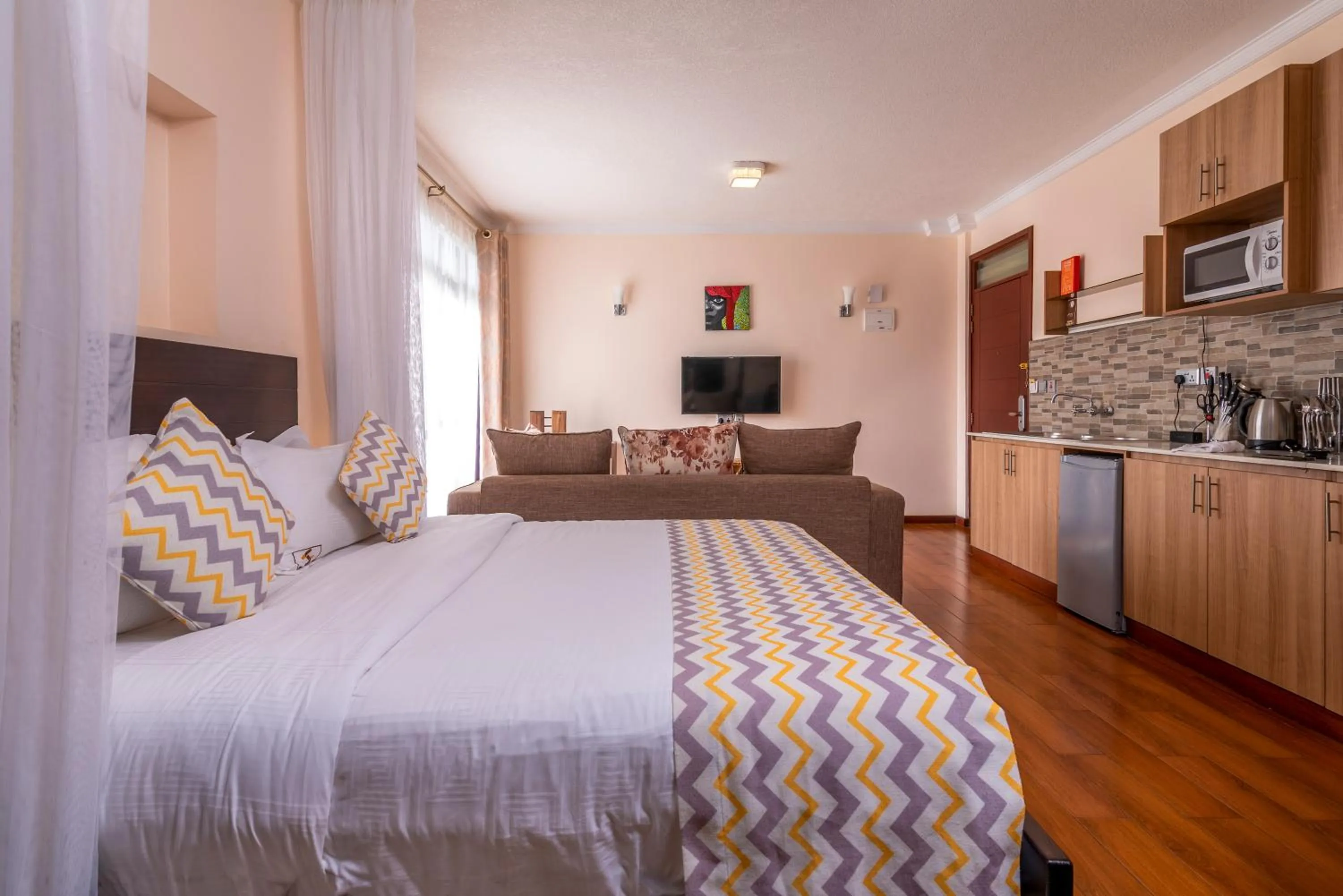 Bed in Highlands Suites Hotel Apartments