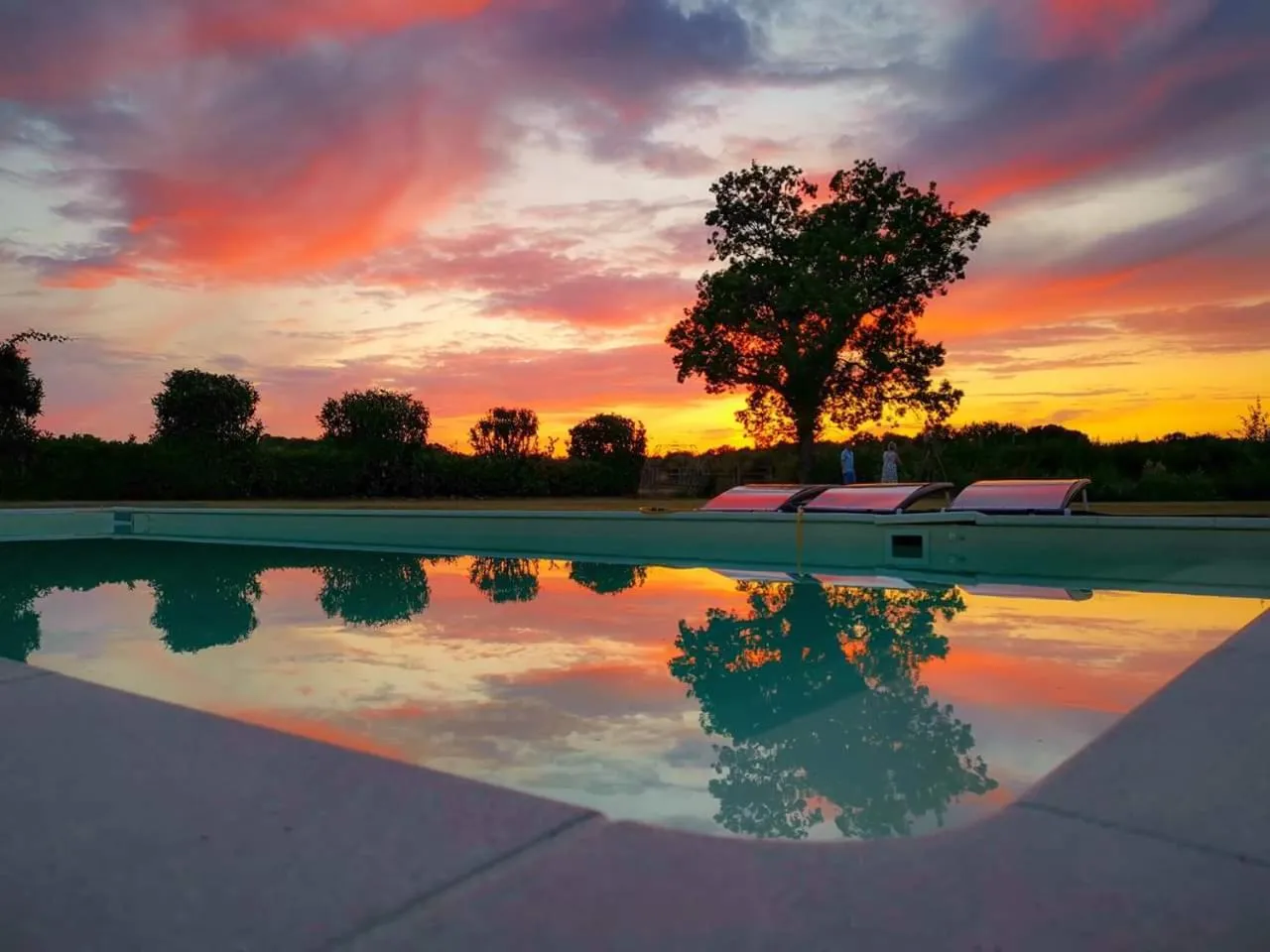Pool view in Manoir la Rumillette