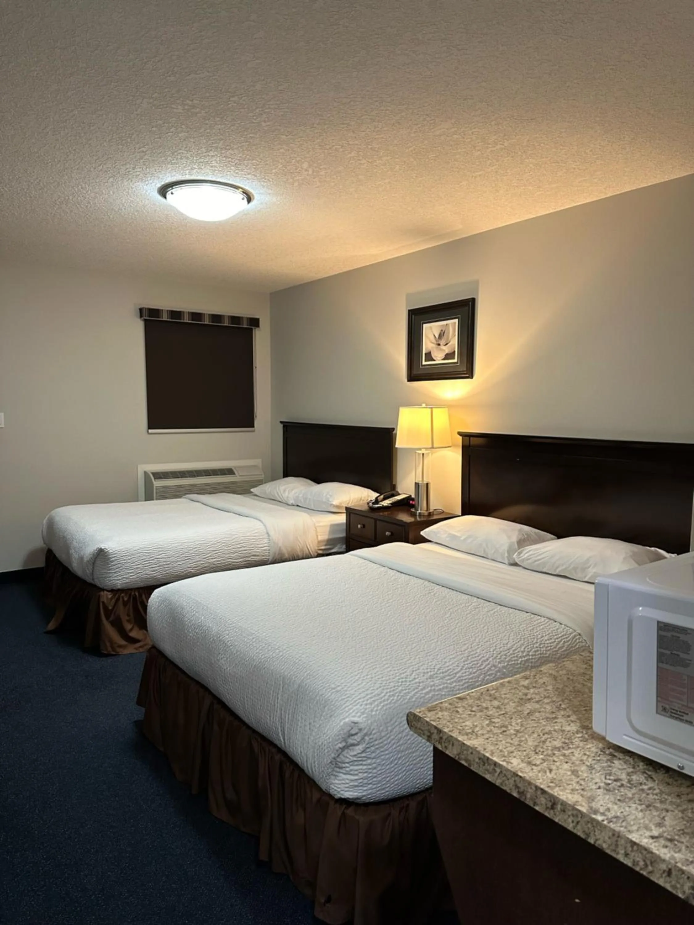 Bed in Travelodge by Wyndham Wetaskiwin