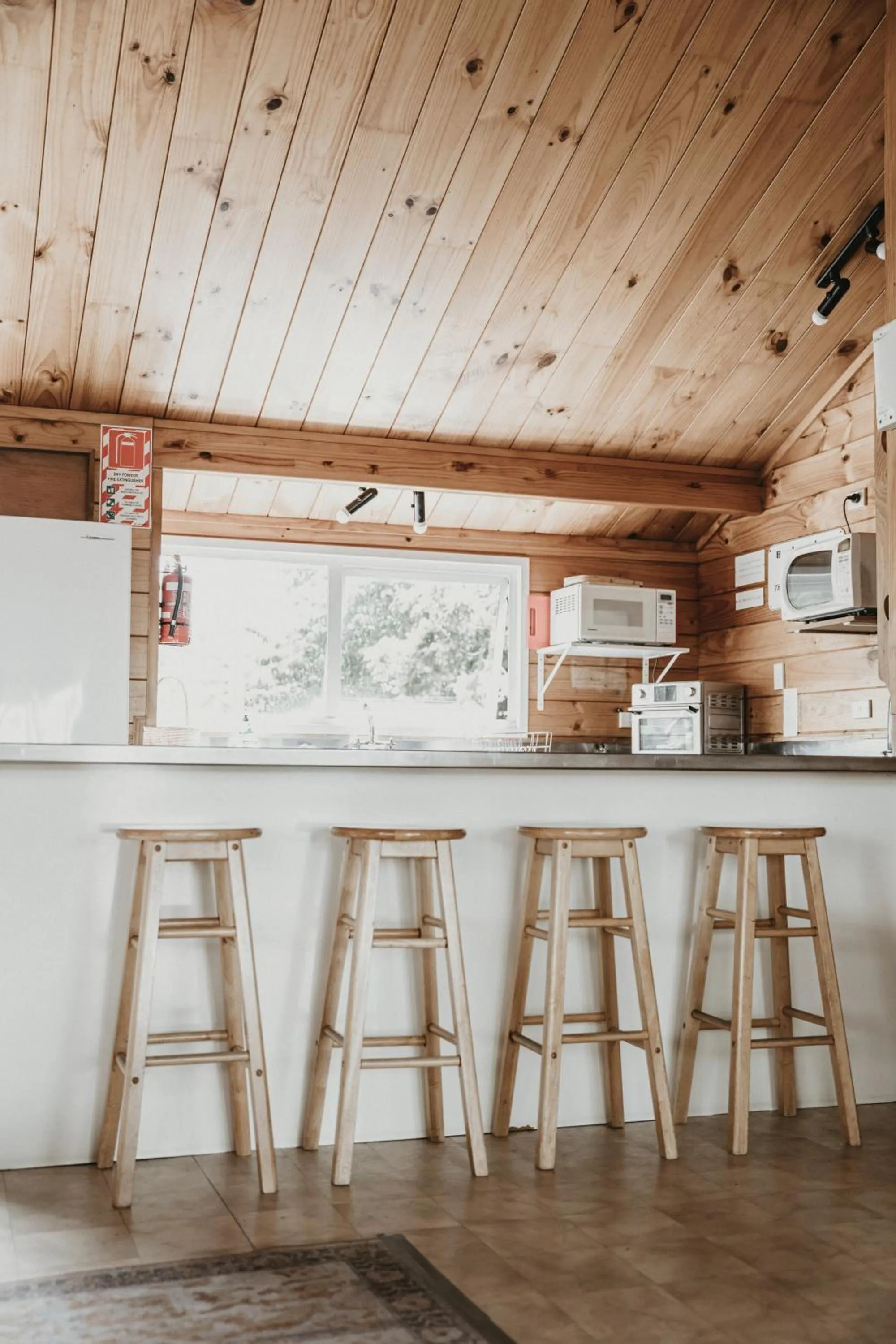 Dining area in Tatahi Cove Back Packer