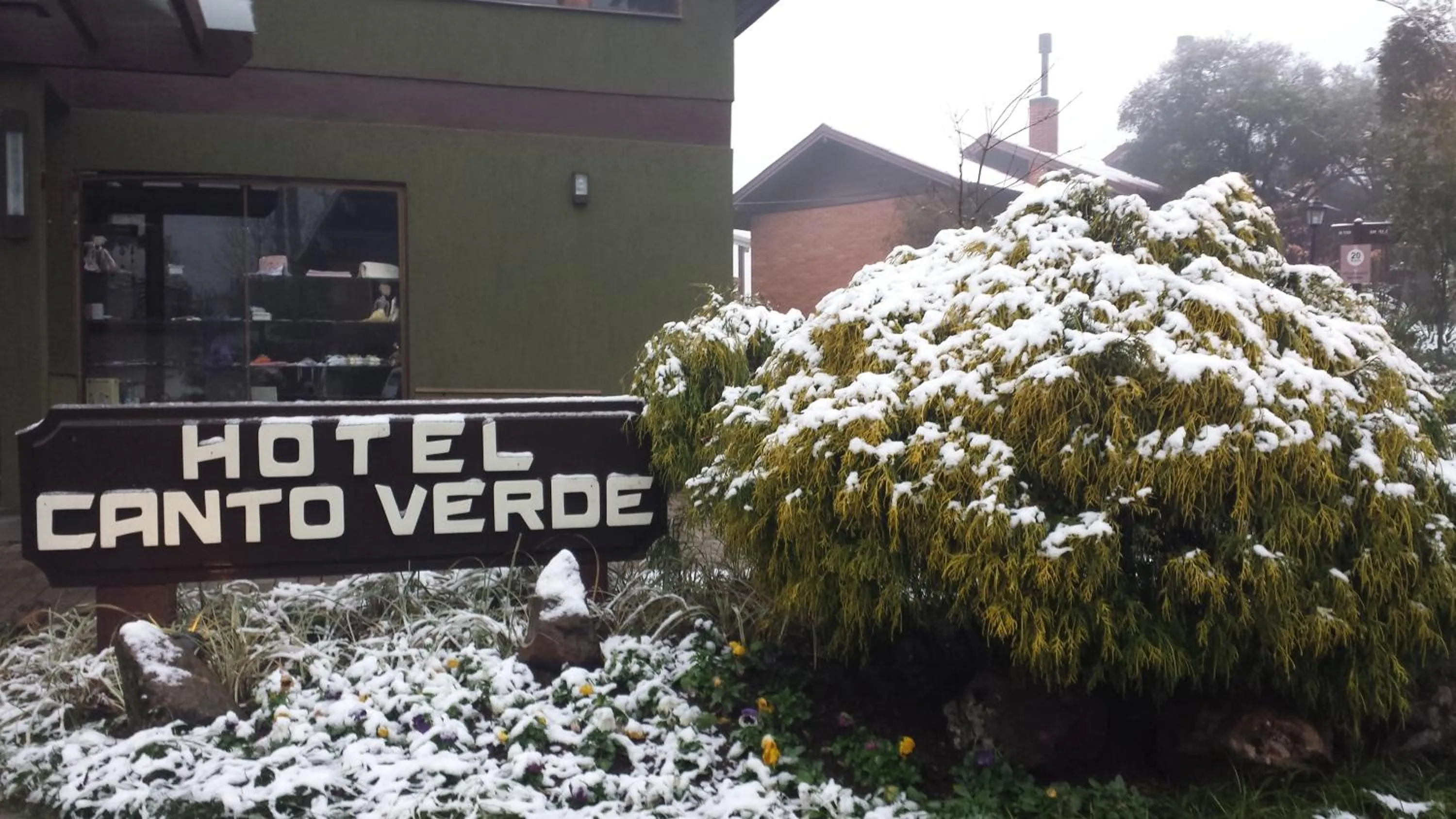 Property logo or sign in Hotel Canto Verde