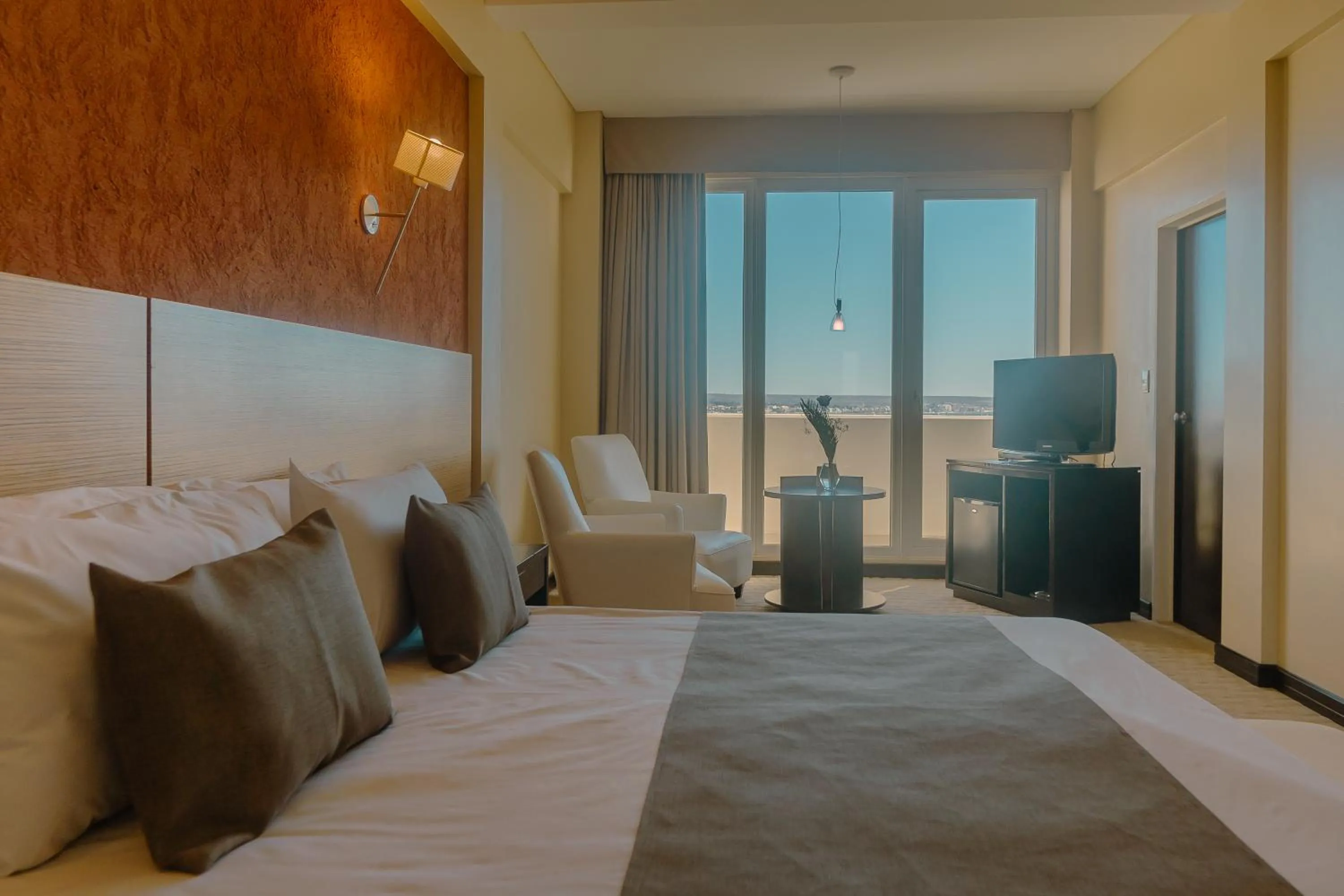 Bed in Rayentray Grand Hotel