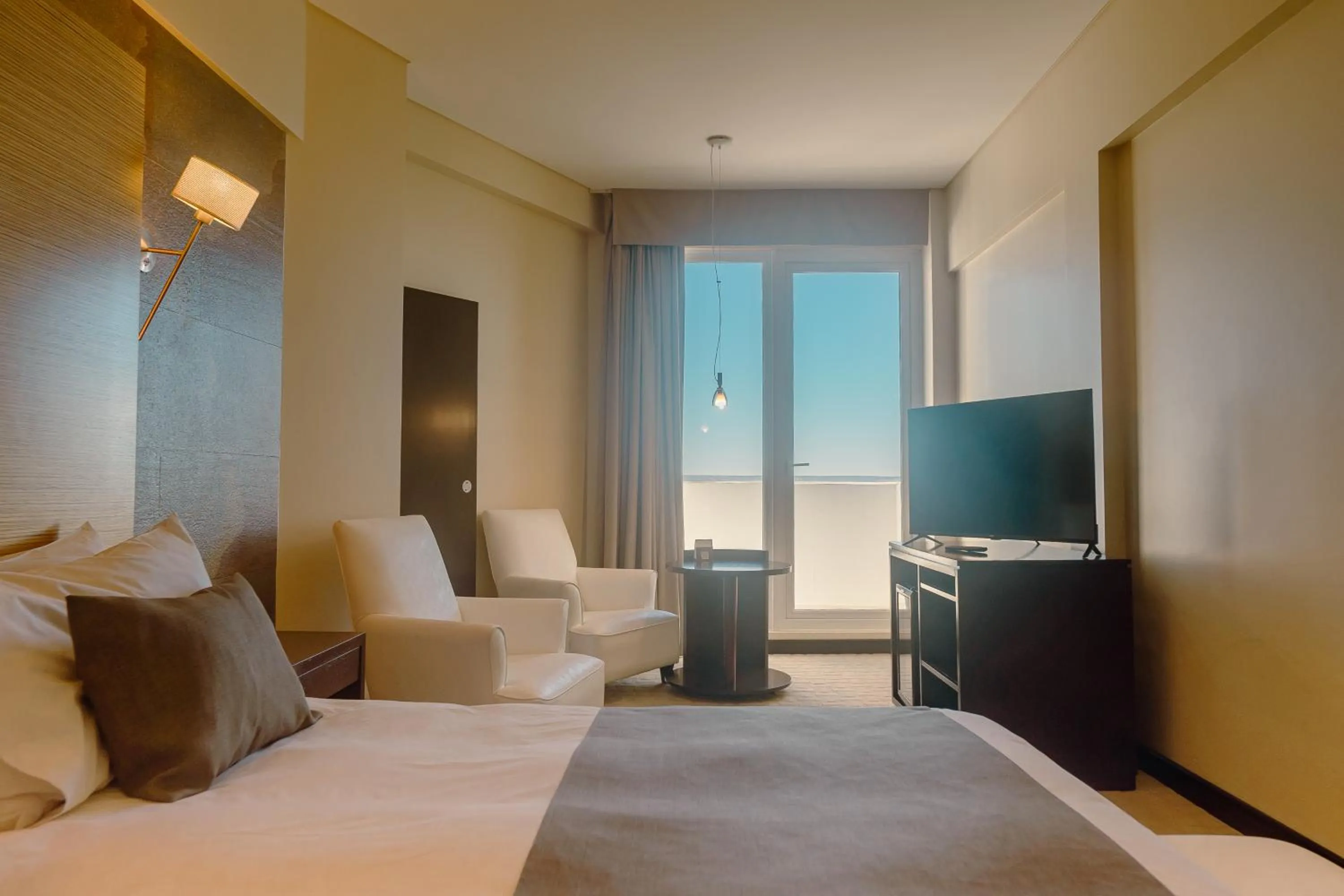 Bed in Rayentray Grand Hotel