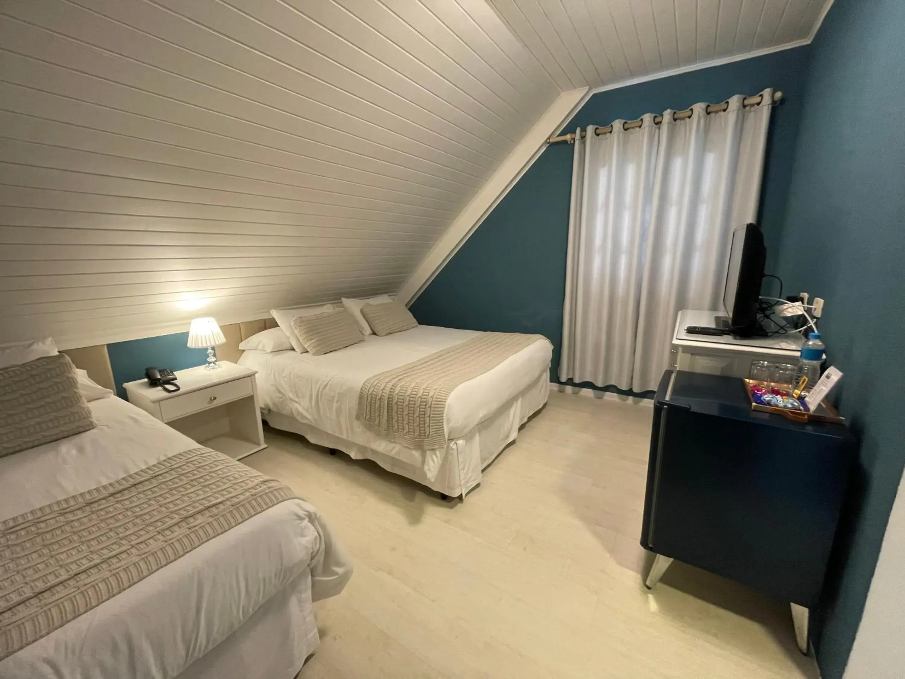 Deluxe Triple Room with City View in Vila de Charme Suítes Deluxe Triple Room with City View in Vila de Charme Suítes