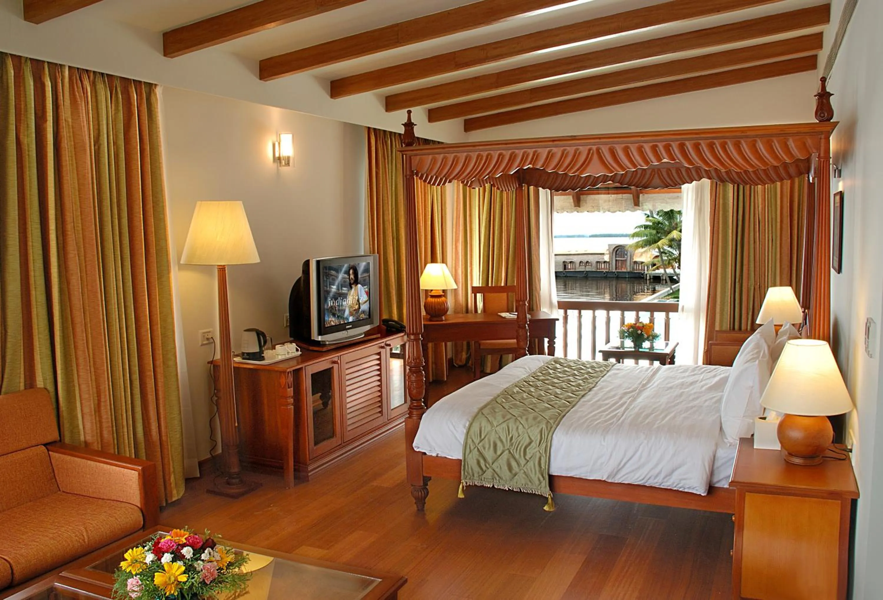 Bed in Lemon Tree Vembanad Lake Resort, Kerala