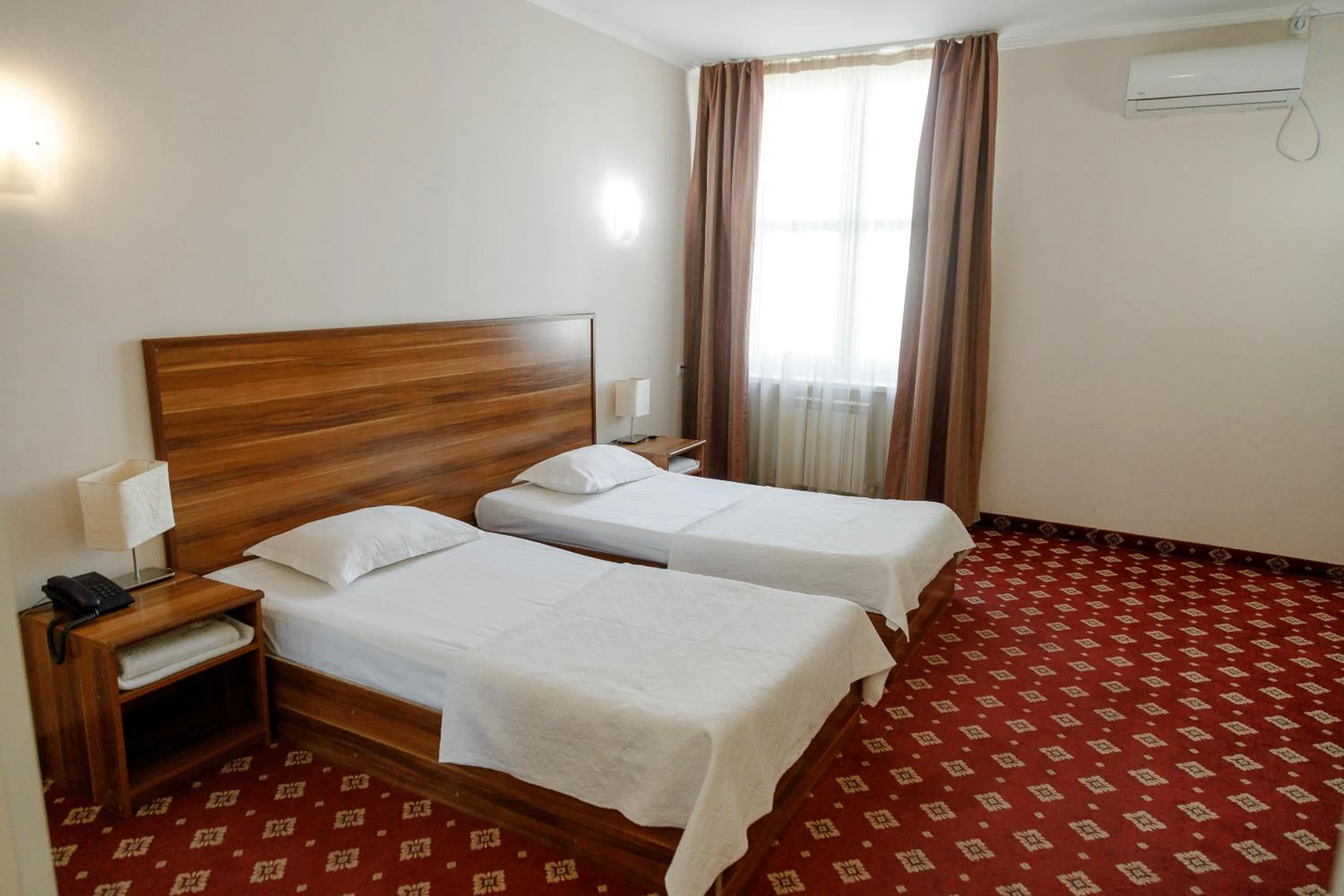 Bed in Silk Way Hotel