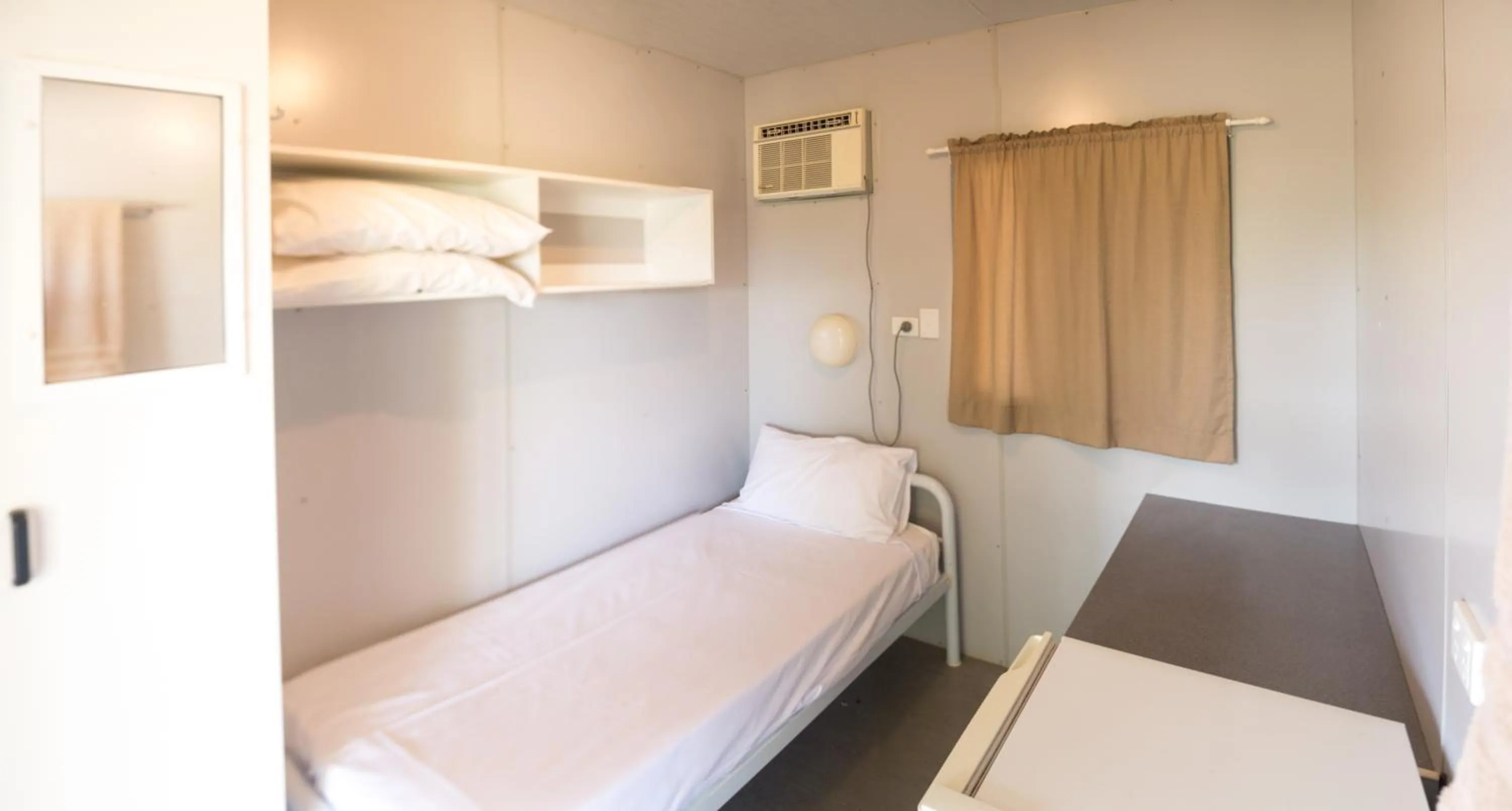 Bed in Outback Adventures Backpackers