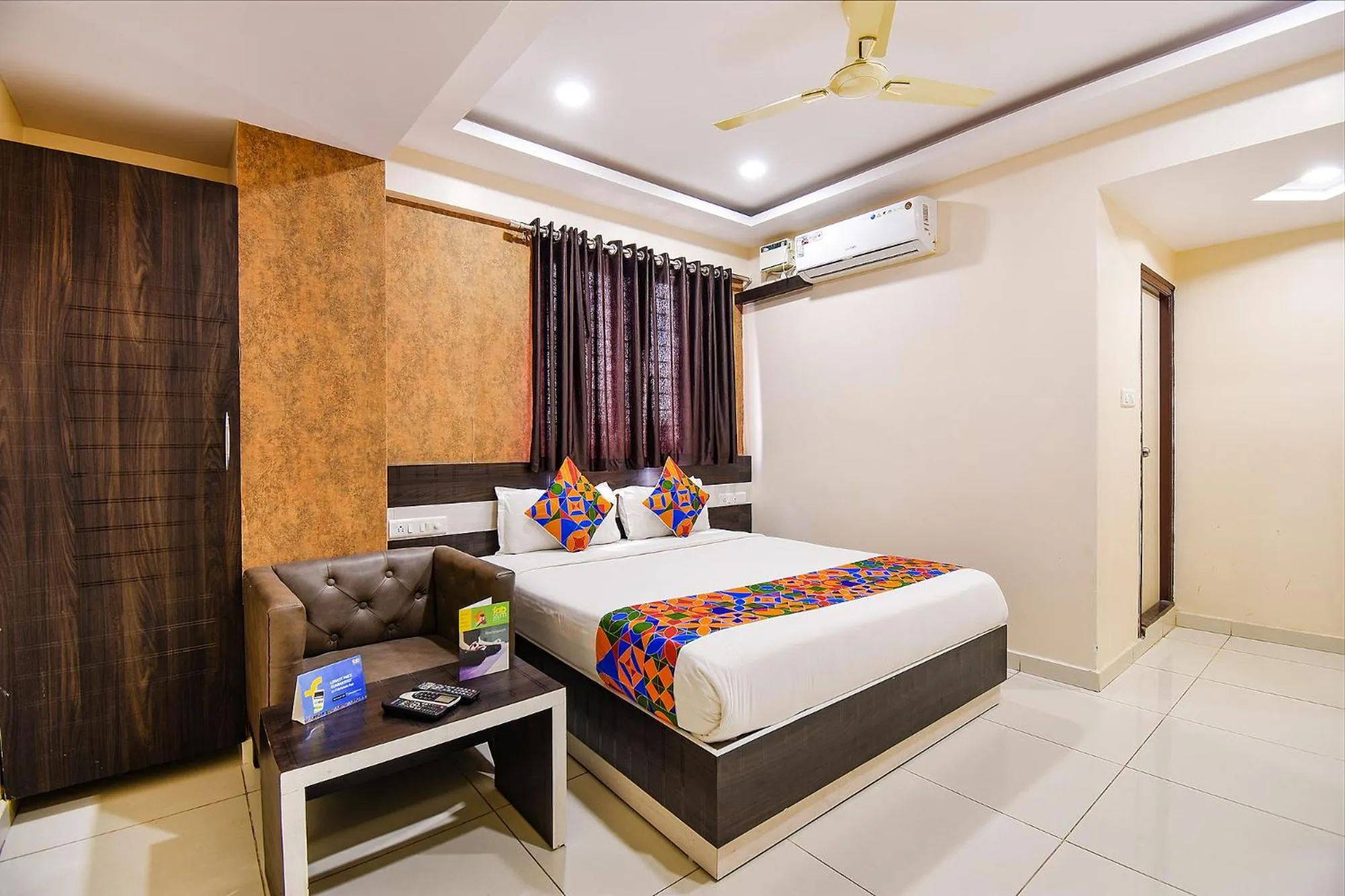 Bed in FabHotel Rotano Suites - Yelahanka