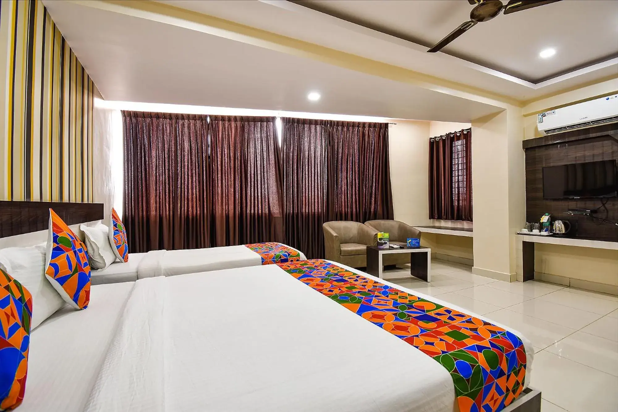 Bedroom, Bed in FabHotel Rotano Suites - Yelahanka Bedroom, Bed in FabHotel Rotano Suites - Yelahanka