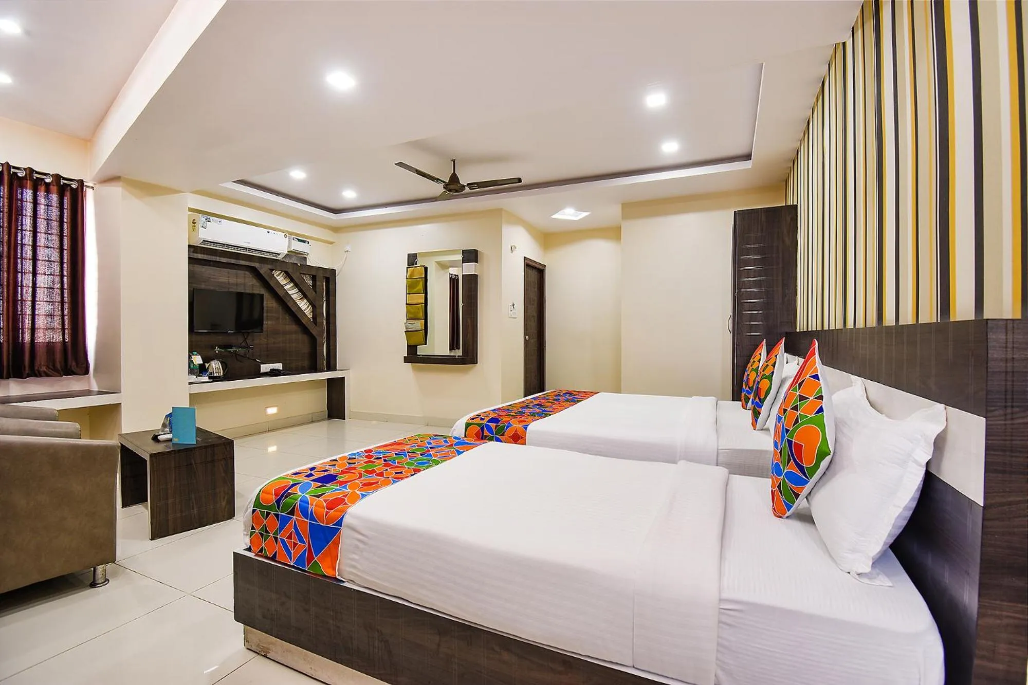 Bed in FabHotel Rotano Suites - Yelahanka