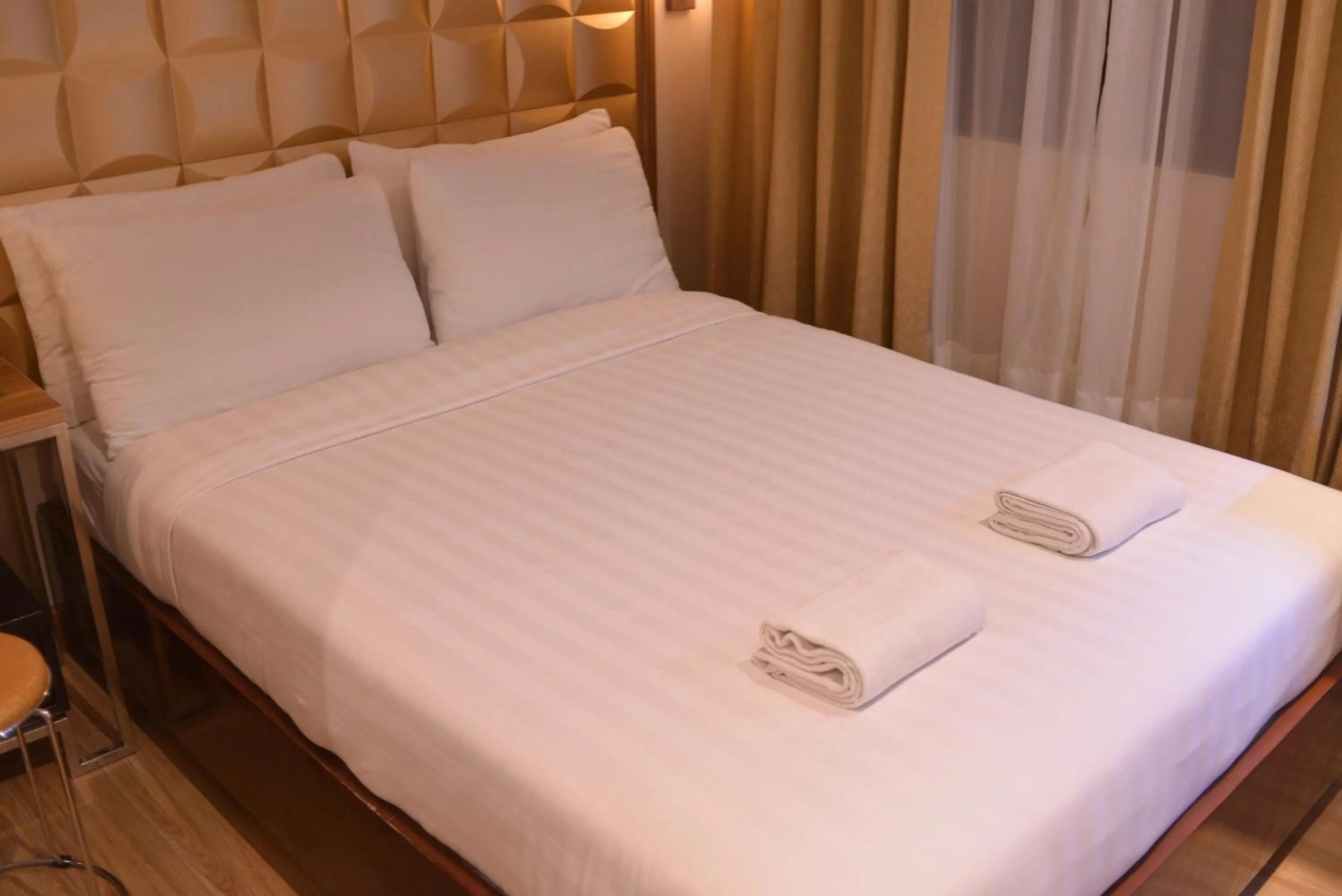 Bed in Robertson Hotel