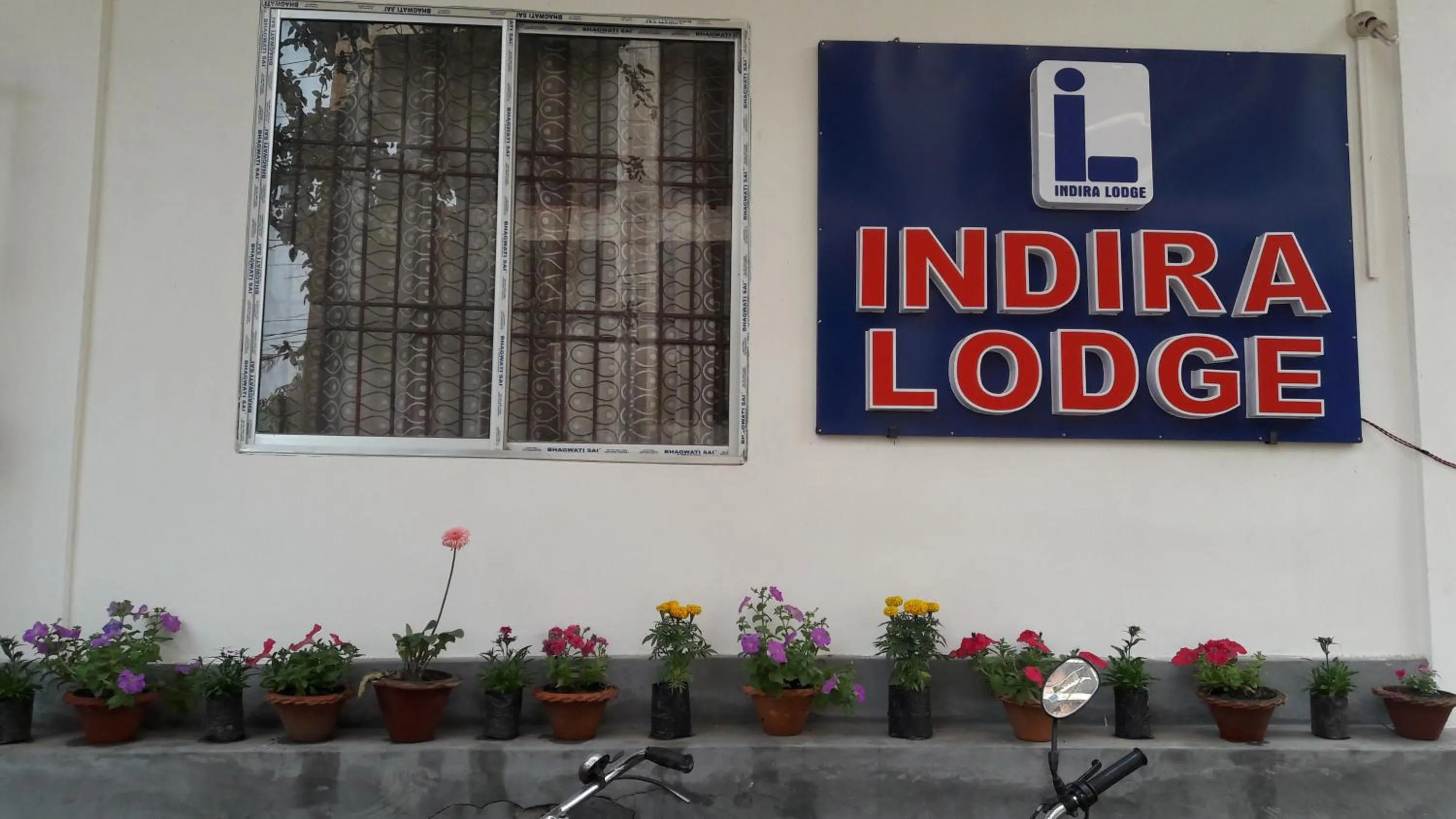 Property logo or sign in Hotel Indira