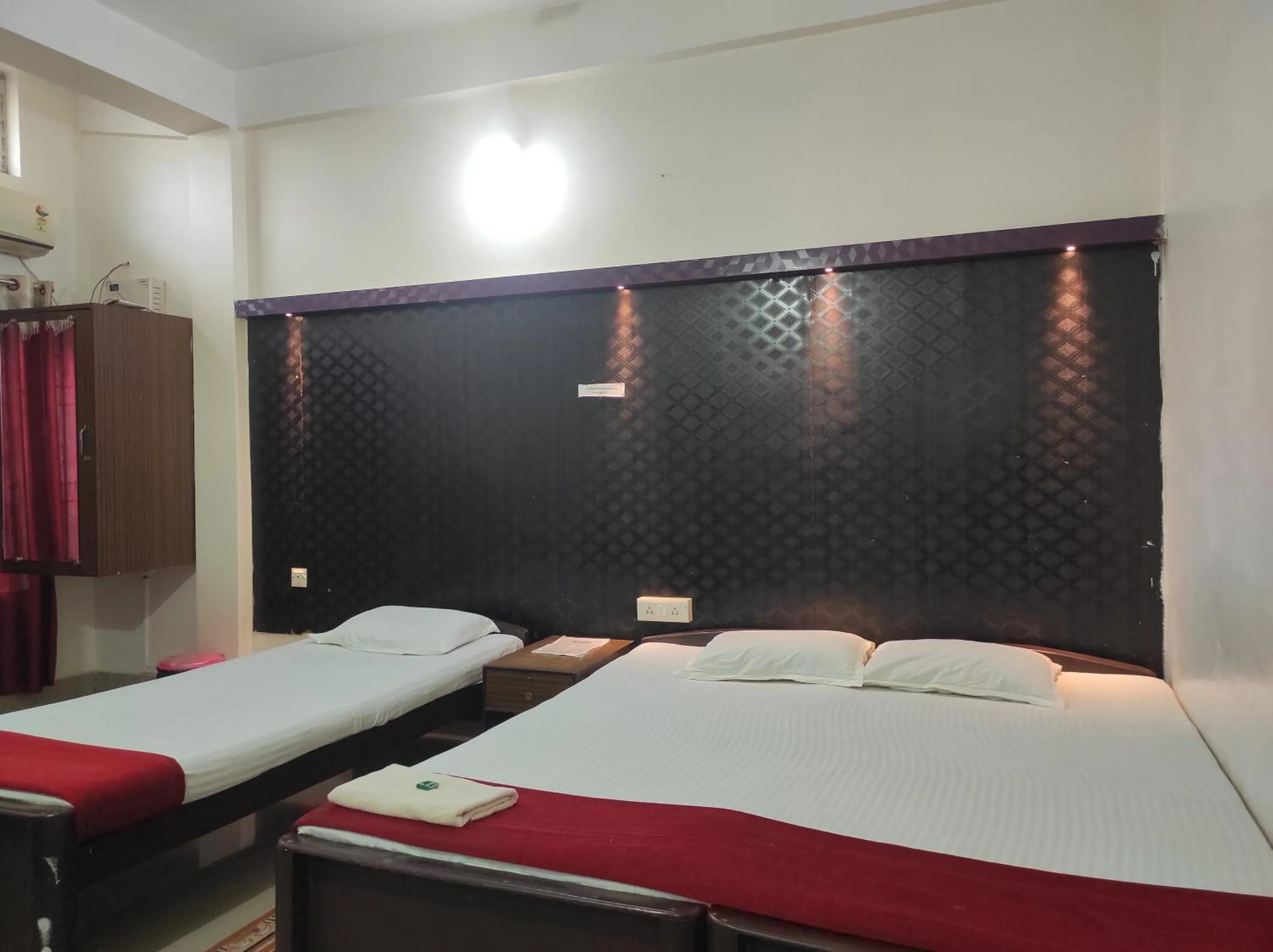 Bed in Hotel Indira
