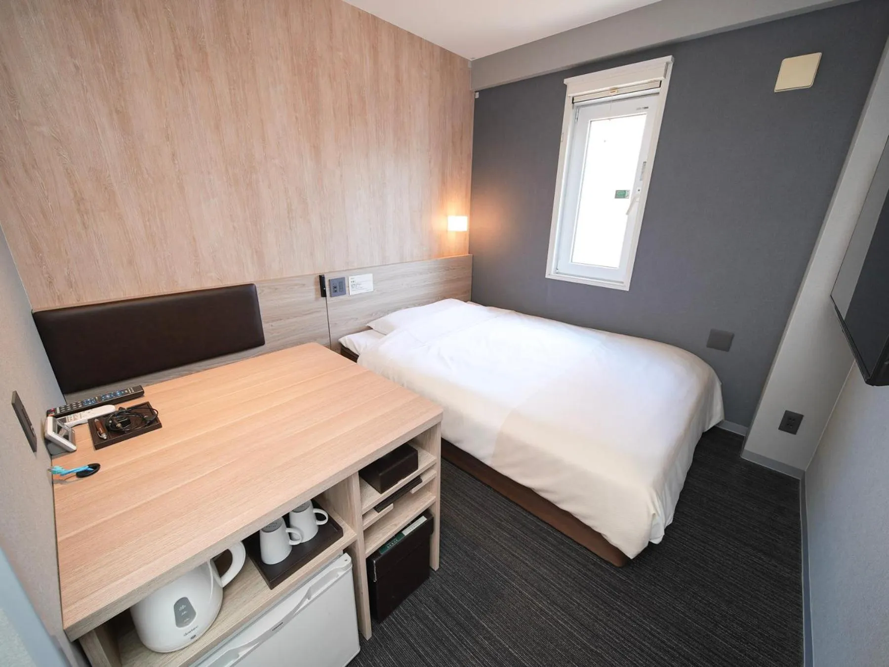 Bed in Super Hotel Hiroshima