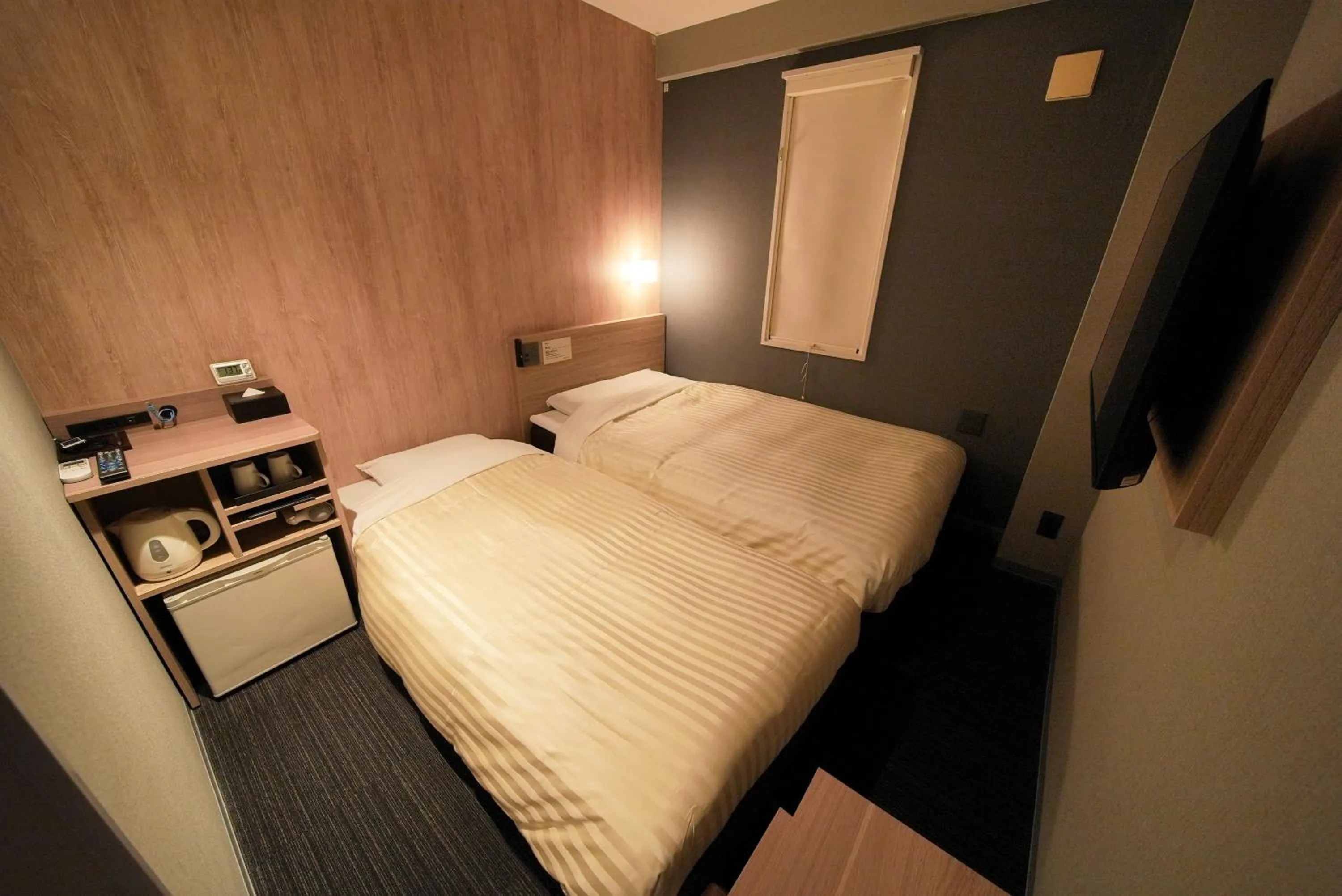 Bed in Super Hotel Hiroshima