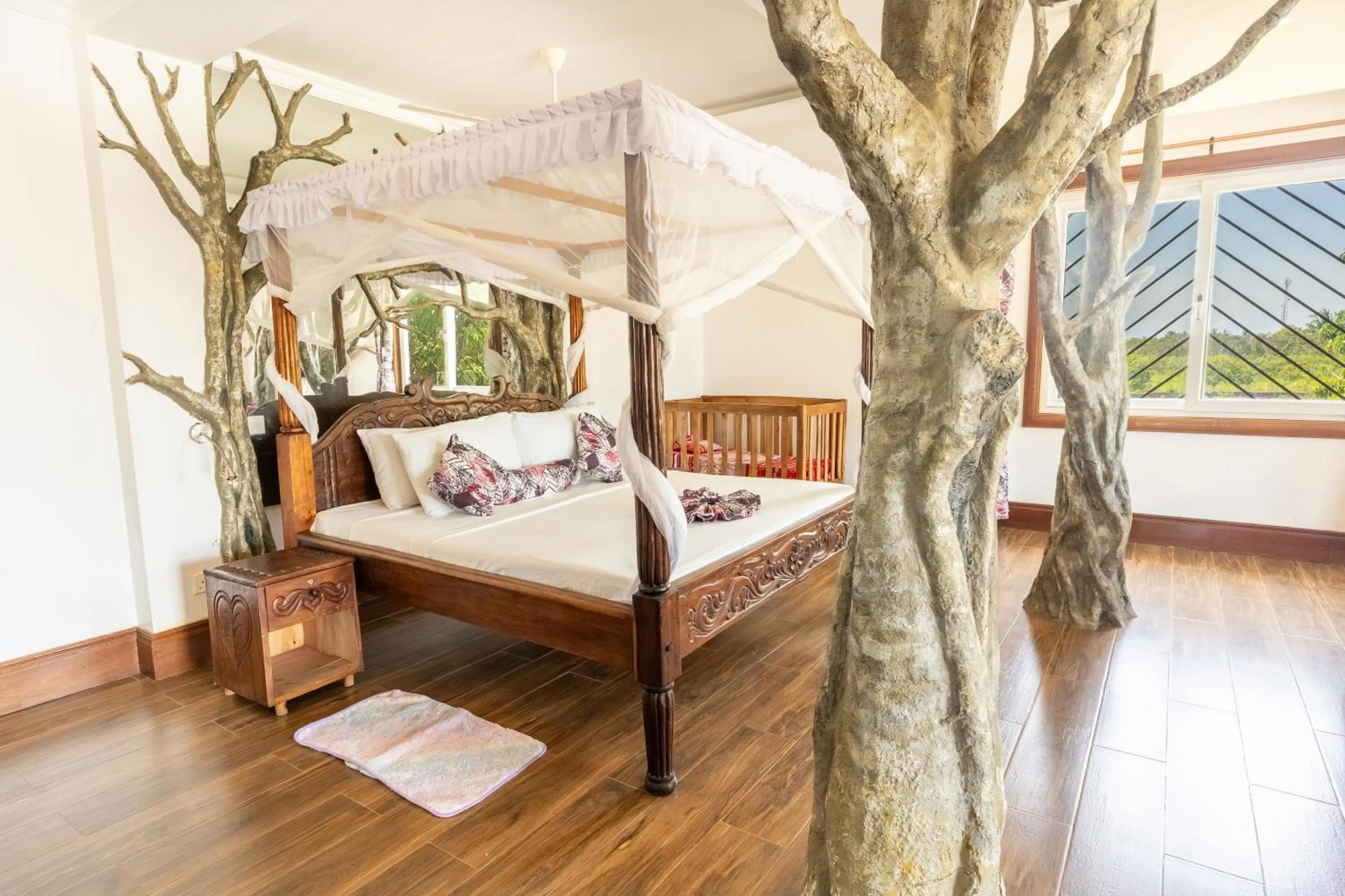 Bed in Queens Chateau Boutique Villa