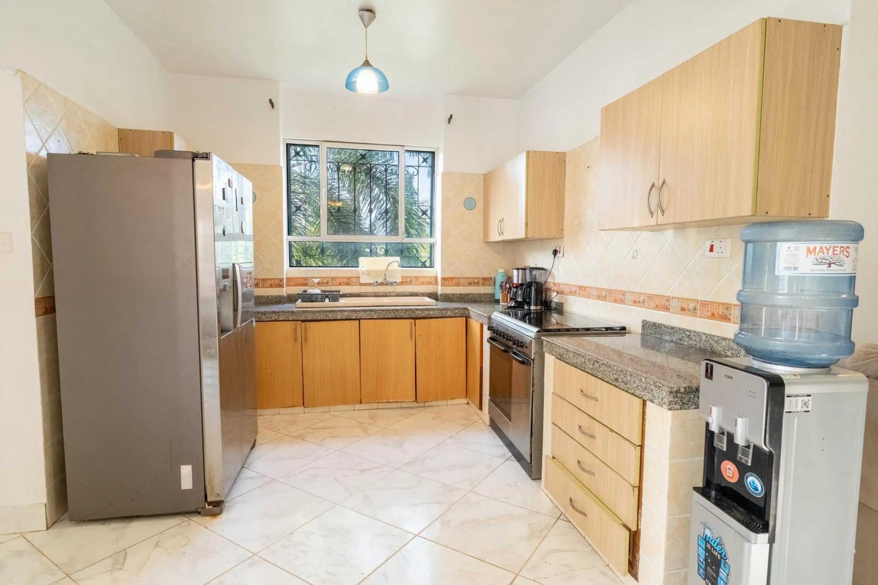 Kitchen or kitchenette in Queens Chateau Boutique Villa