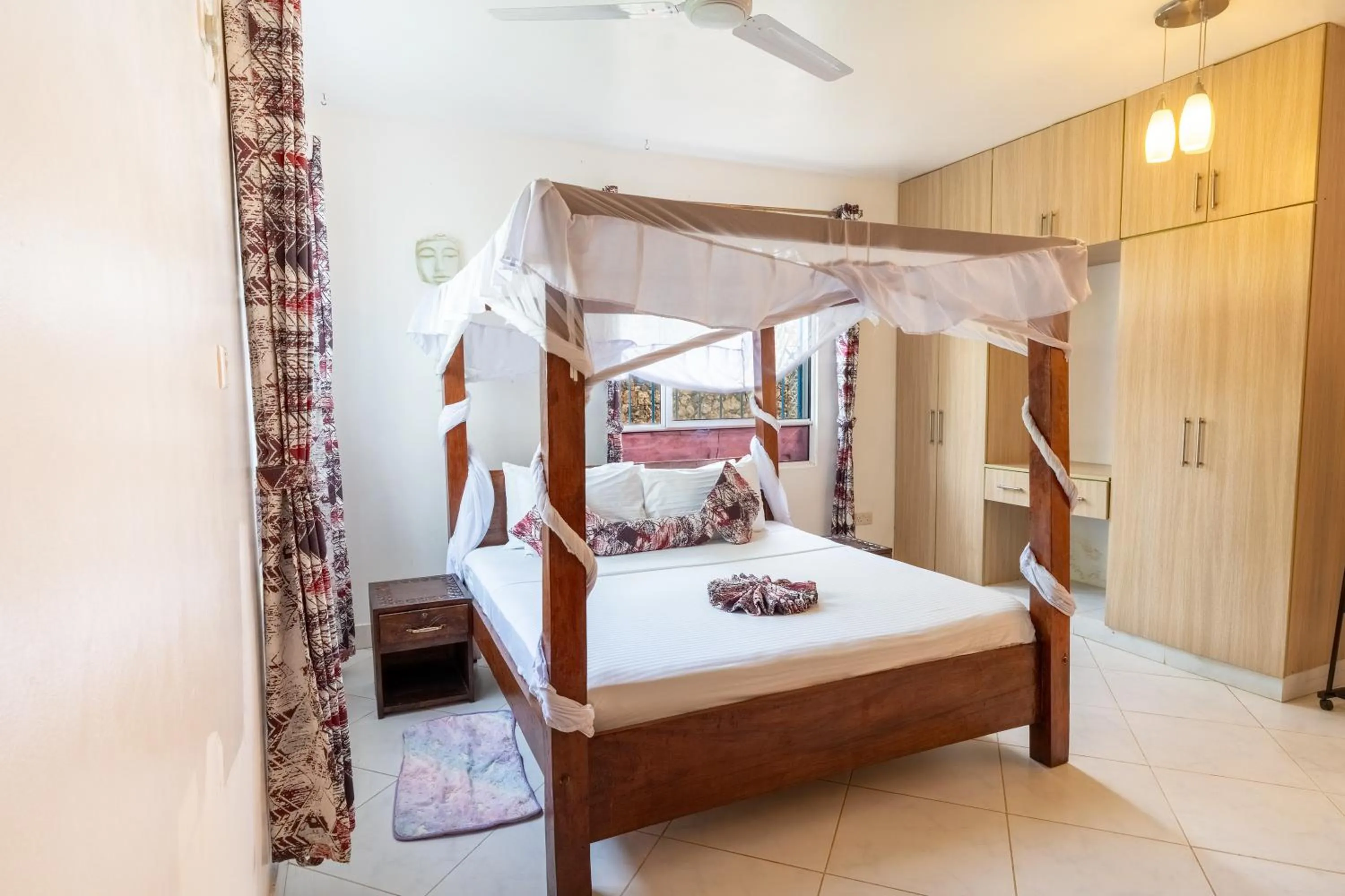 Bed in Queens Chateau Boutique Villa