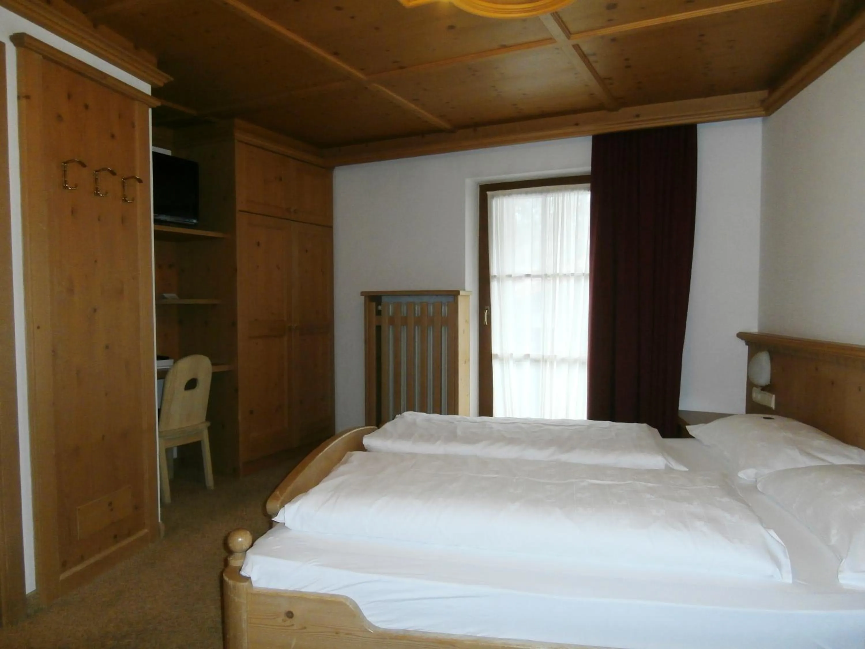 Bed in Piccolo Hotel Gurschler