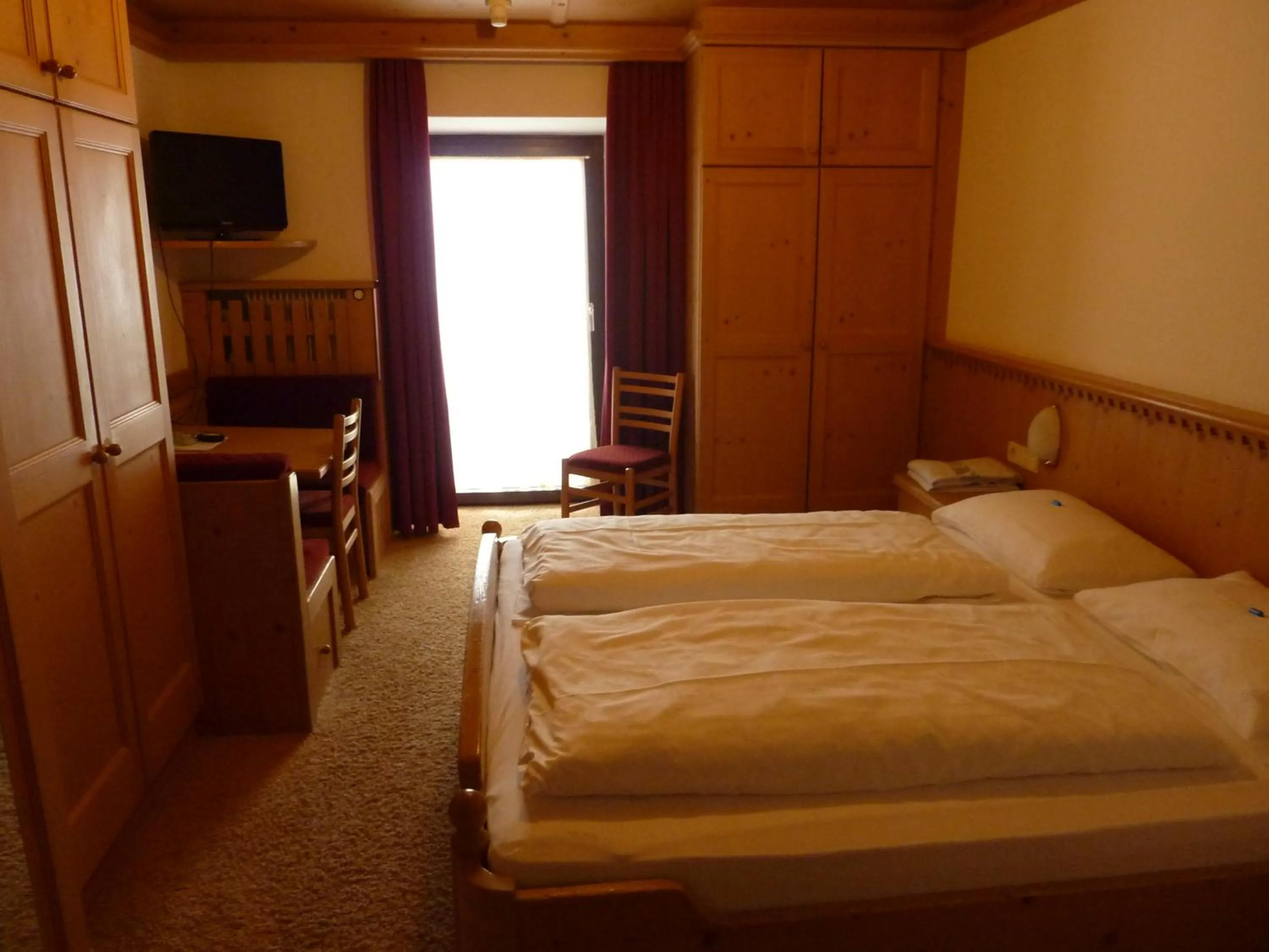 Bed in Piccolo Hotel Gurschler