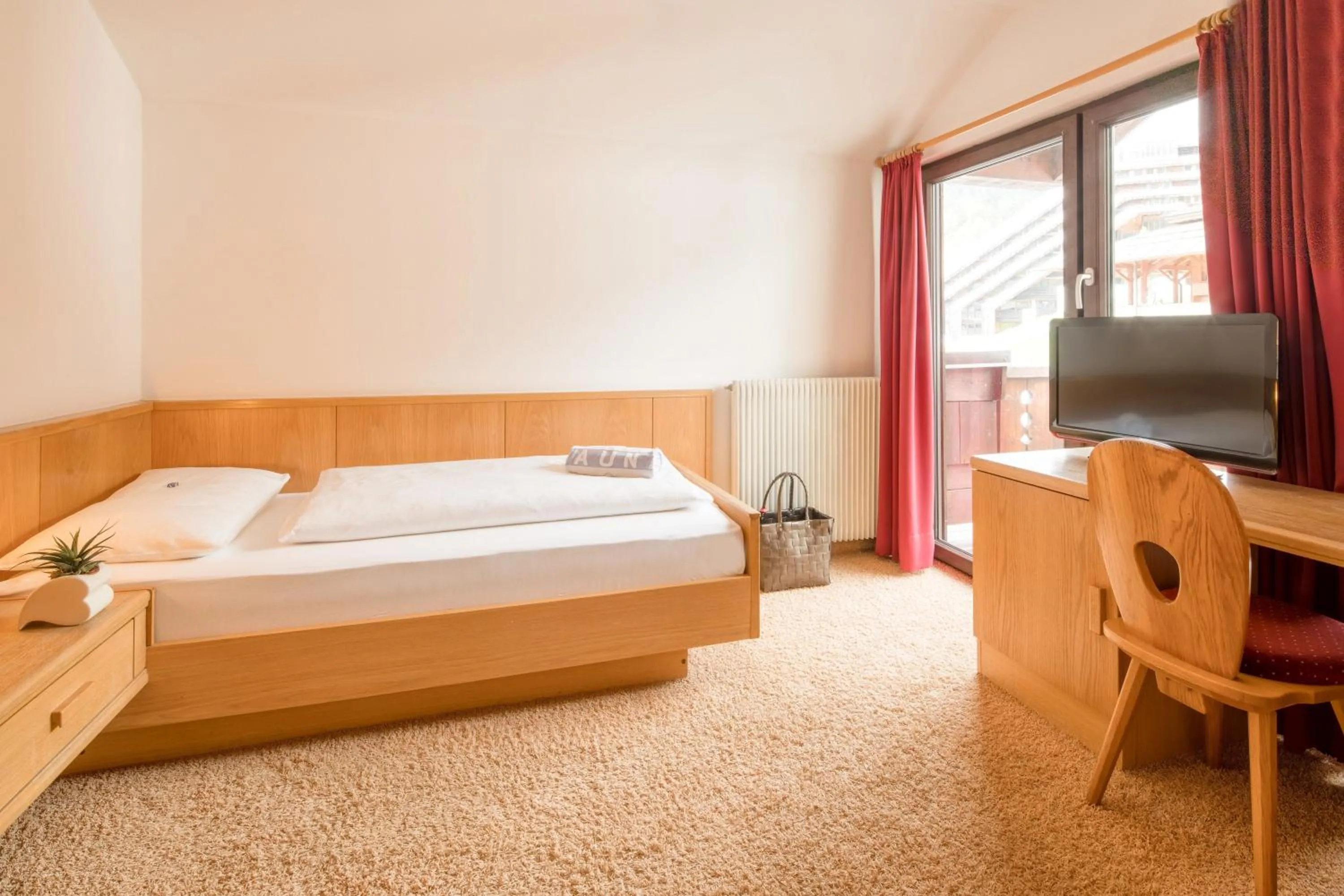 Bed in Piccolo Hotel Gurschler