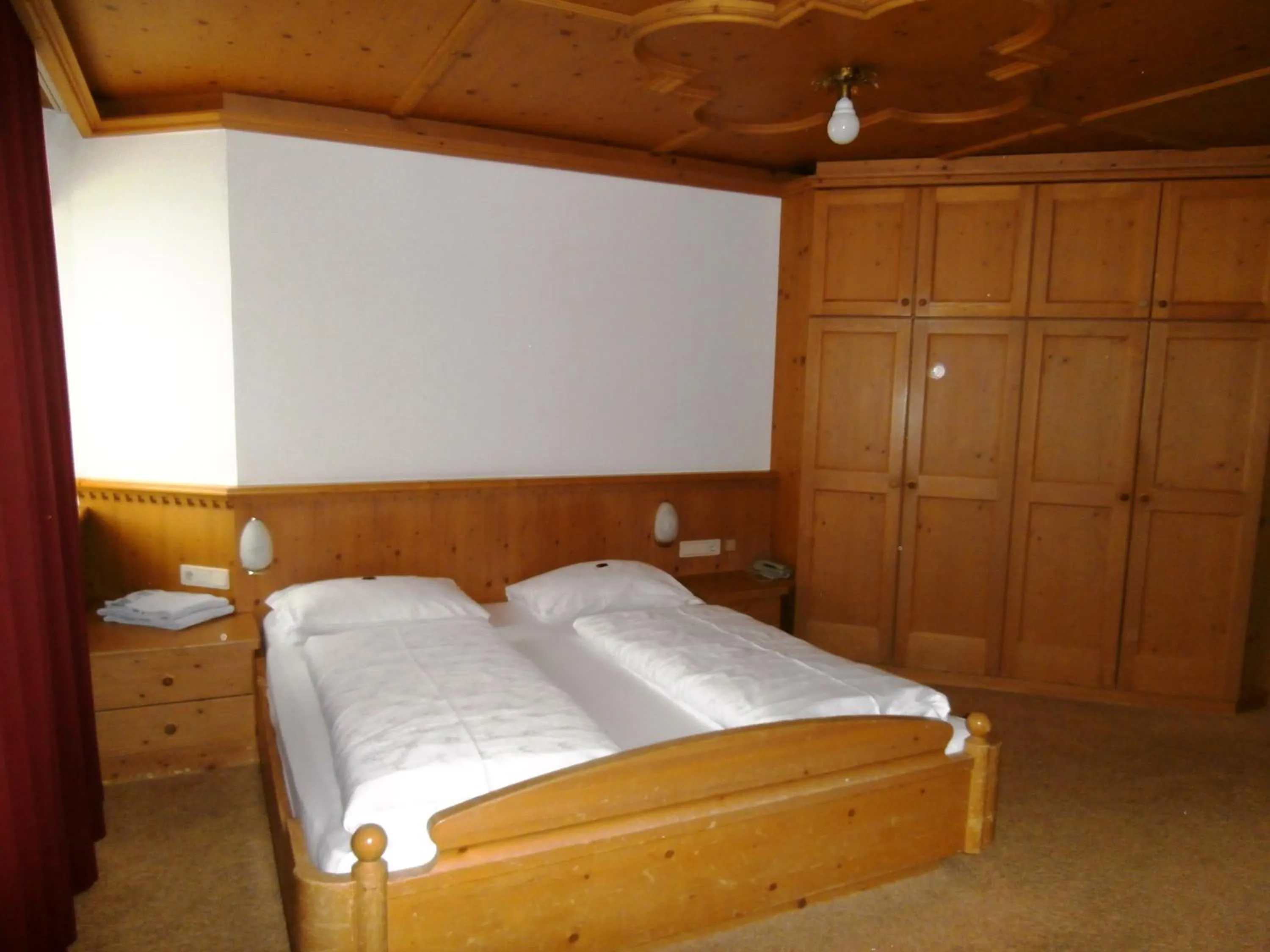 Bed in Piccolo Hotel Gurschler