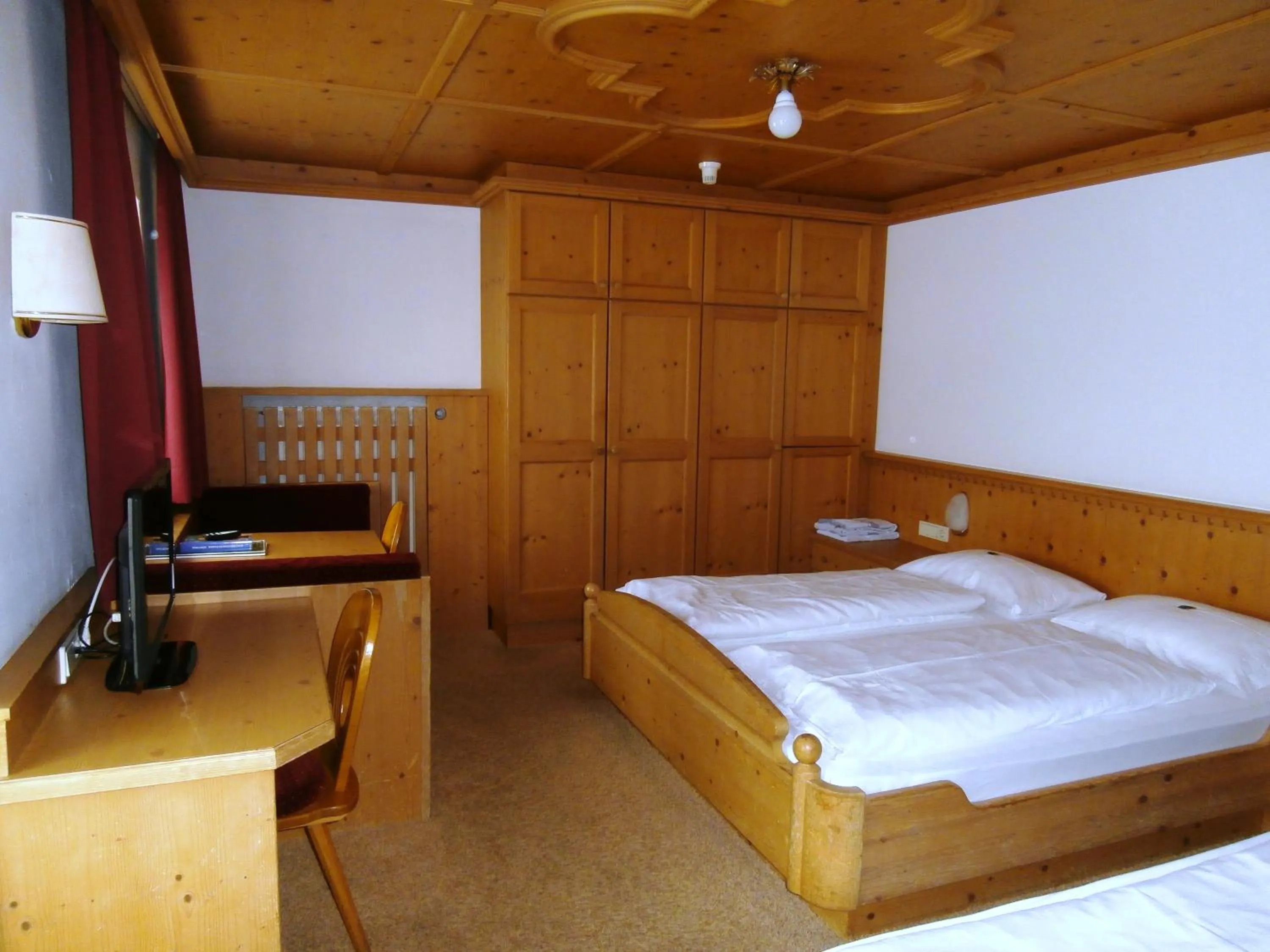 Bed in Piccolo Hotel Gurschler