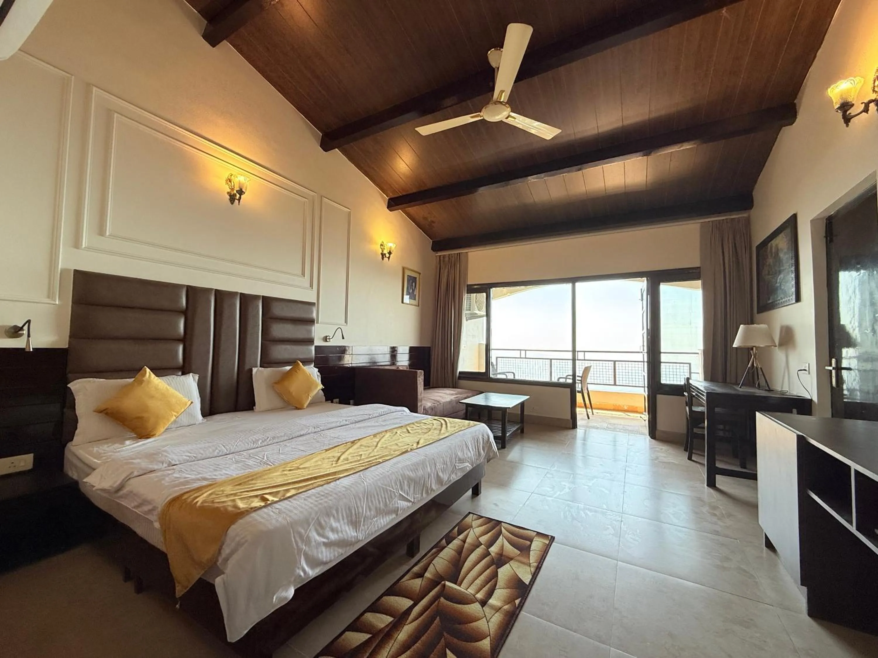 Bed in ECKO Kasang Regency Hill Resort