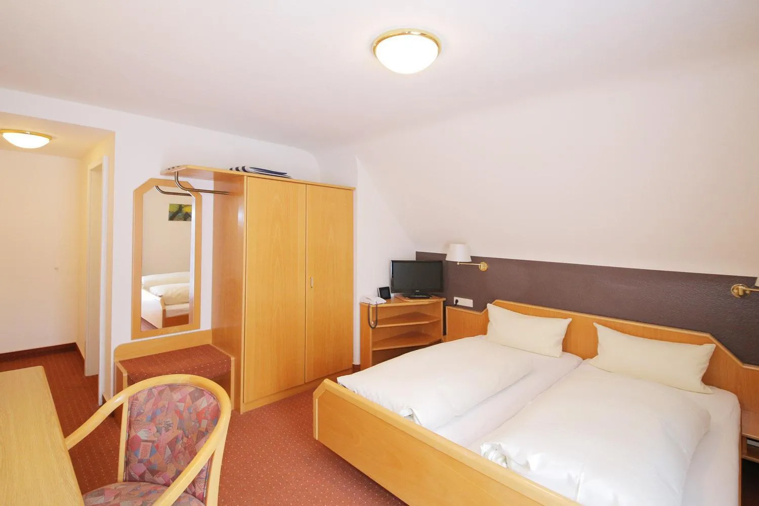 Photo of the whole room, Bed in Hotel Platzhirsch