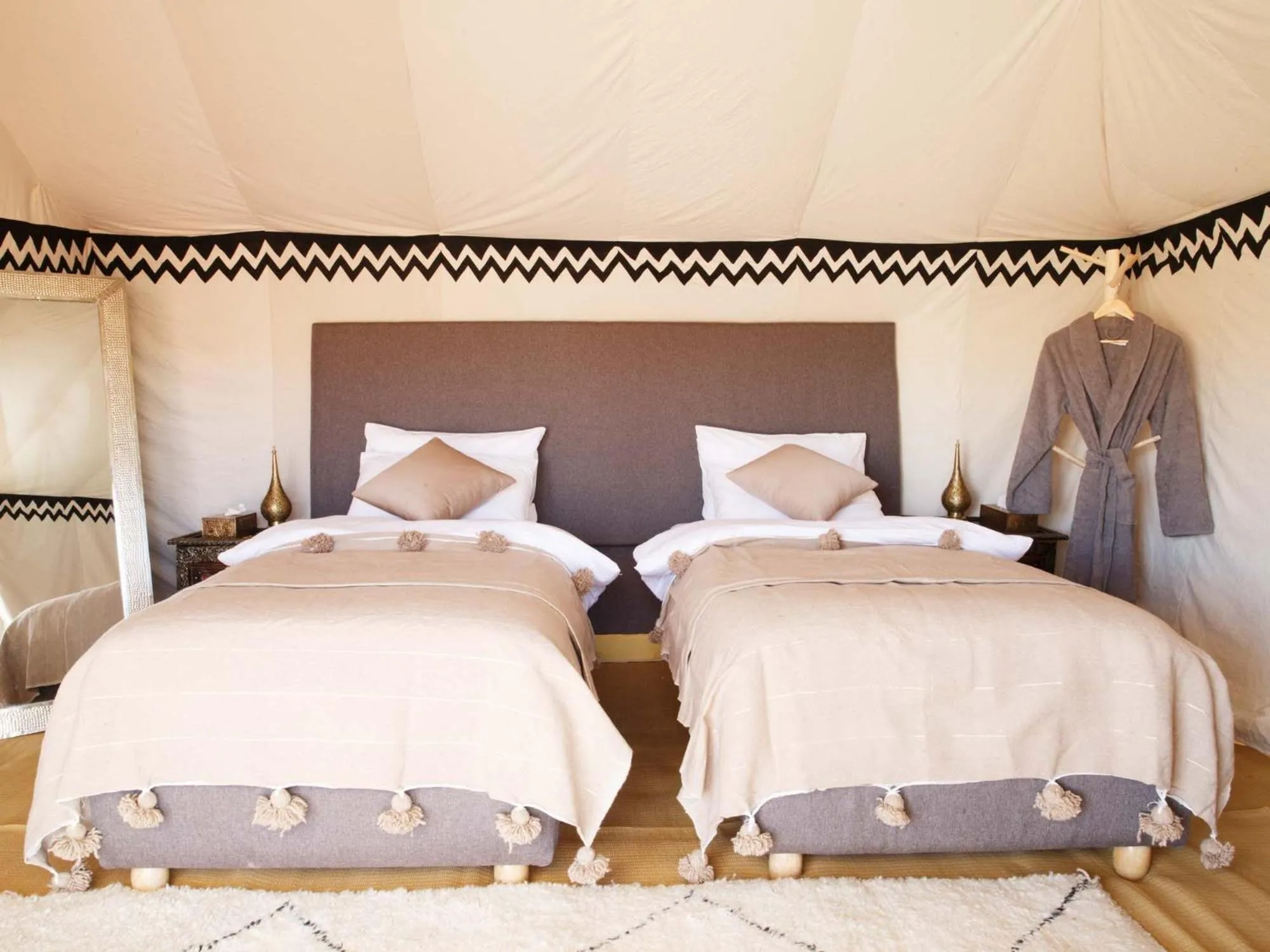 Bed in Nubia Luxury Camp Erg Chegaga