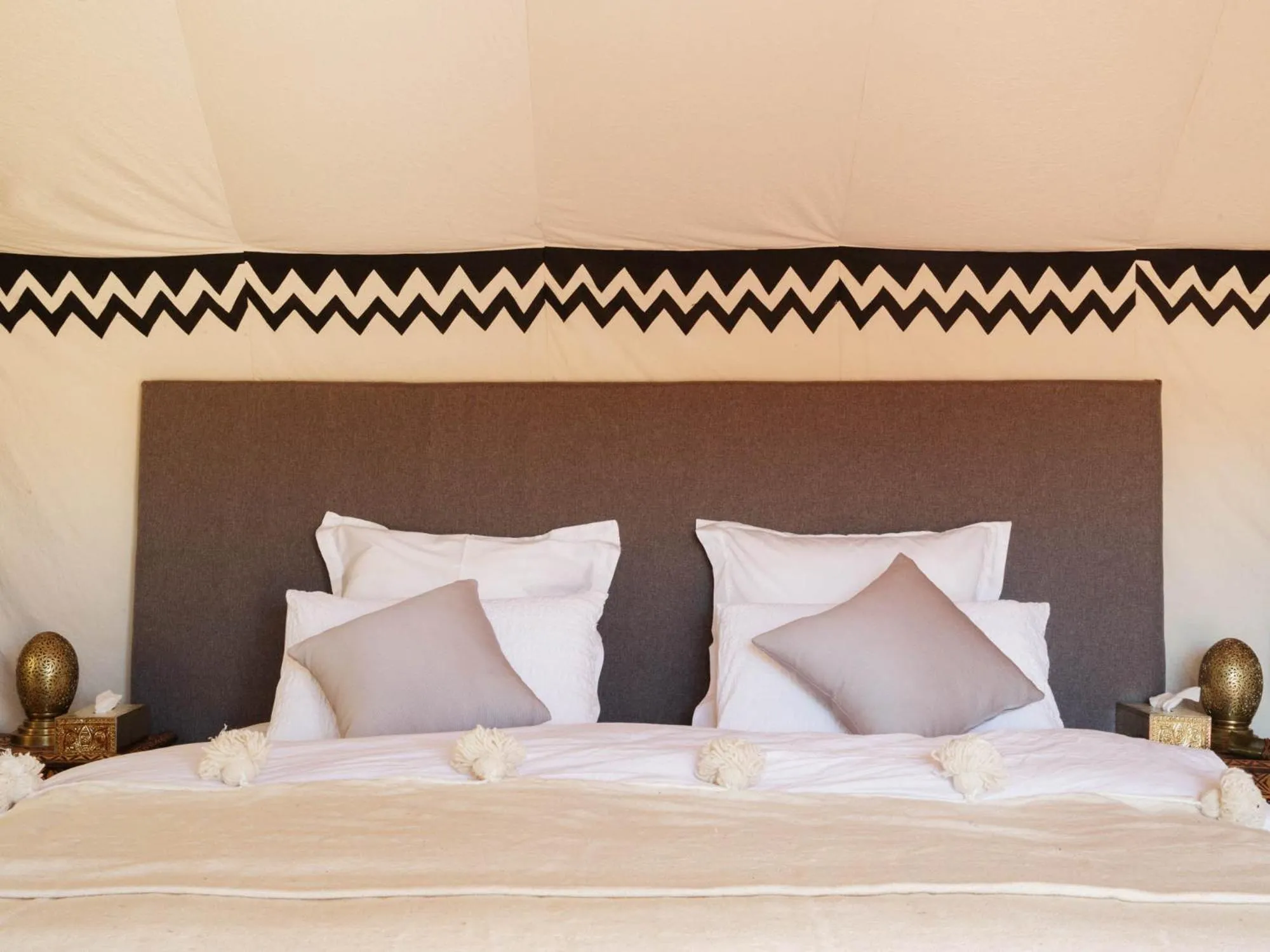 Bed in Nubia Luxury Camp Erg Chegaga