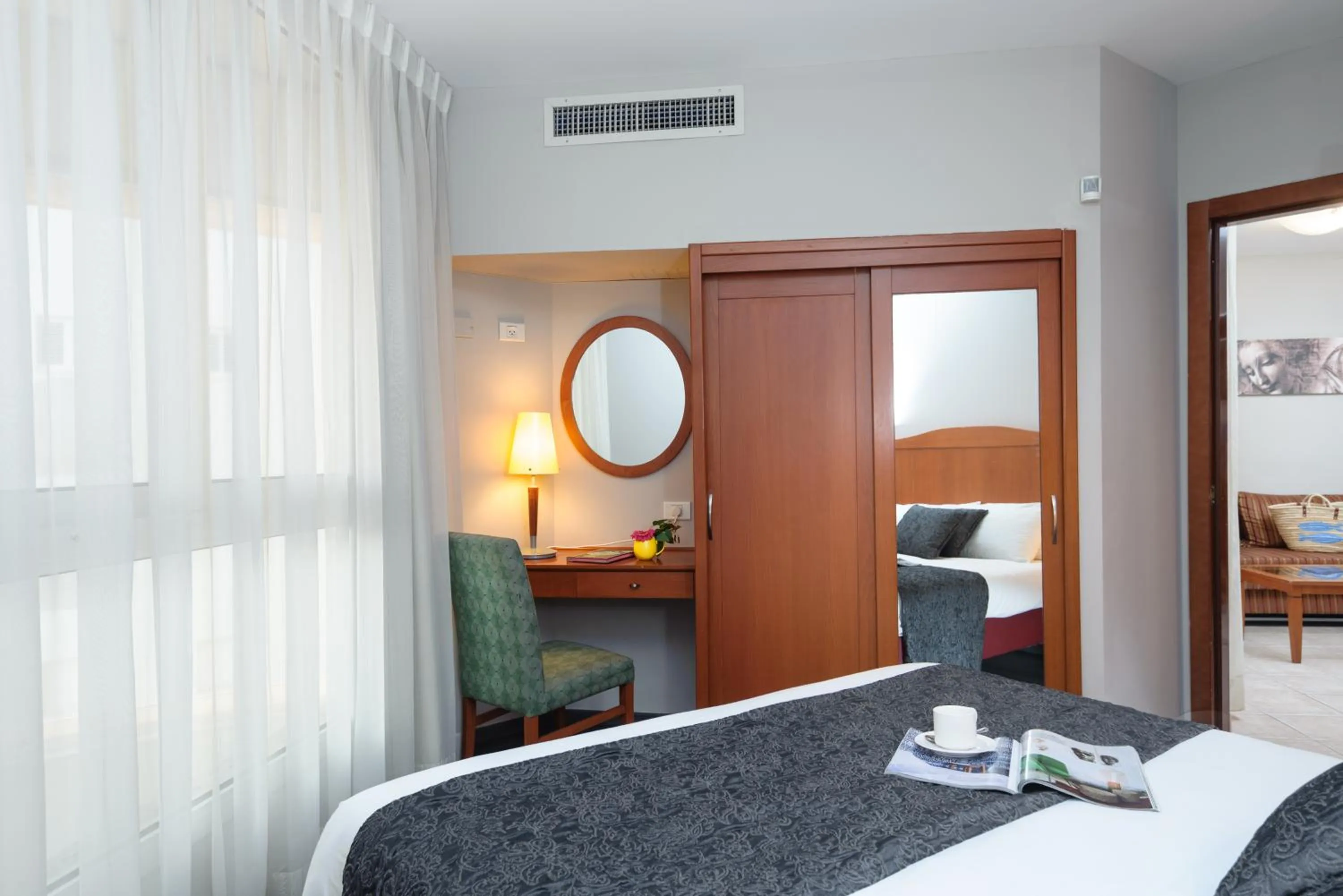 Bedroom in Arena Hotel by the Beach