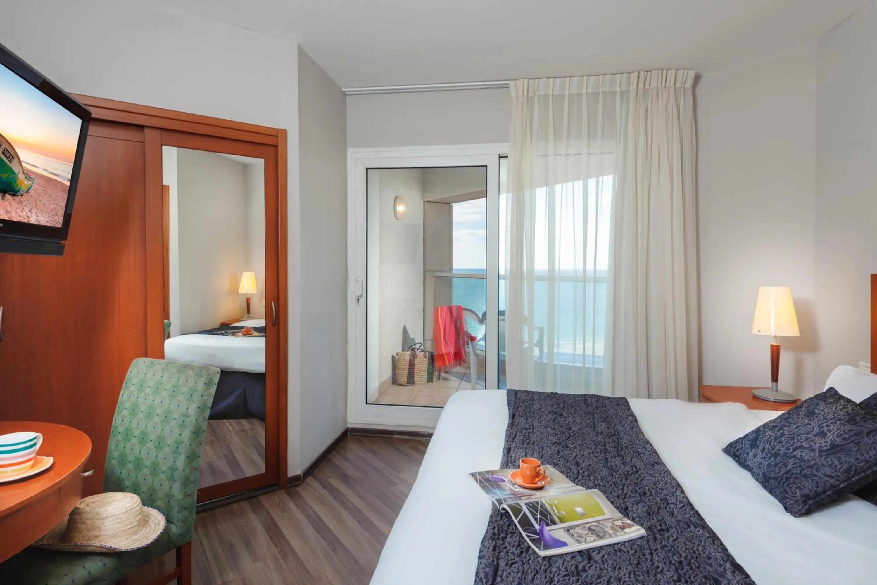 Bedroom in Arena Hotel by the Beach