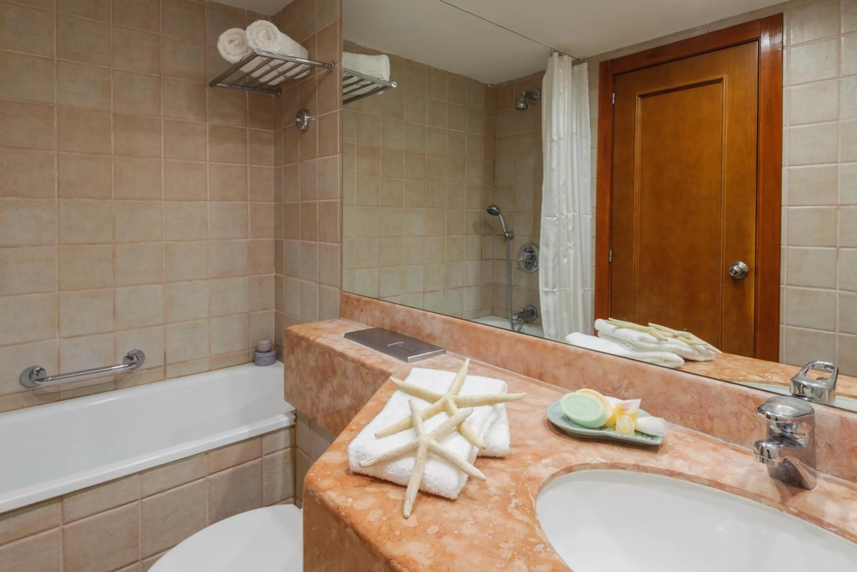 Bathroom in Arena Hotel by the Beach