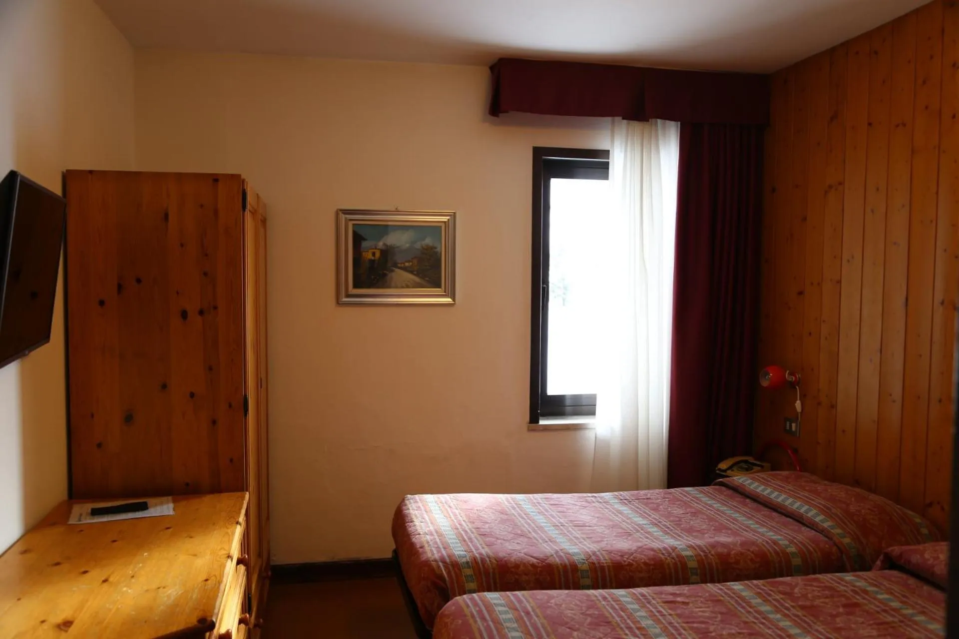 Bed in Hotel Dolomiti