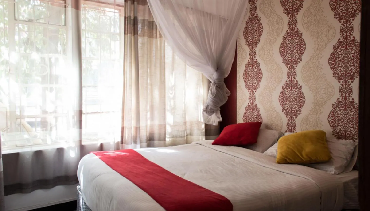 Bed in Hotel Embassy