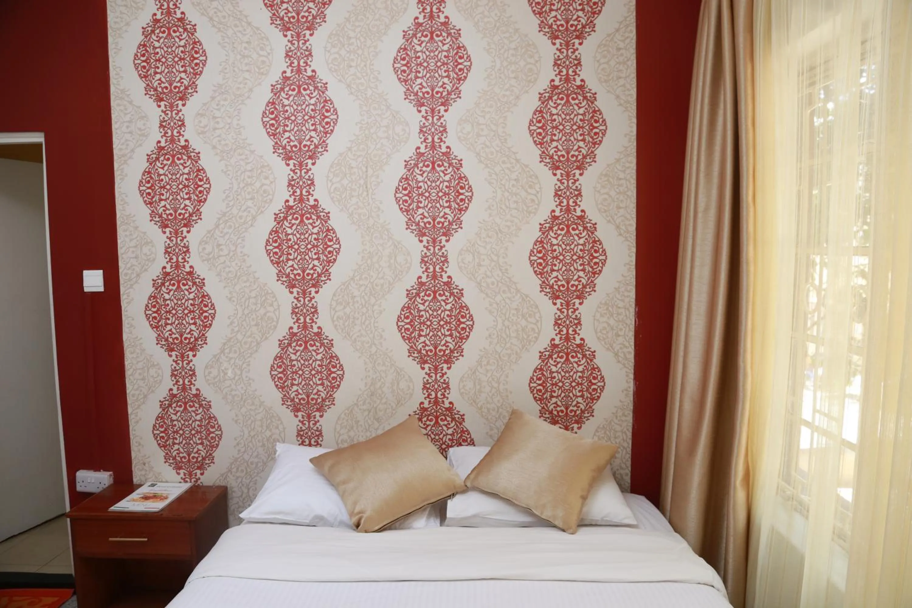 Bed in Hotel Embassy