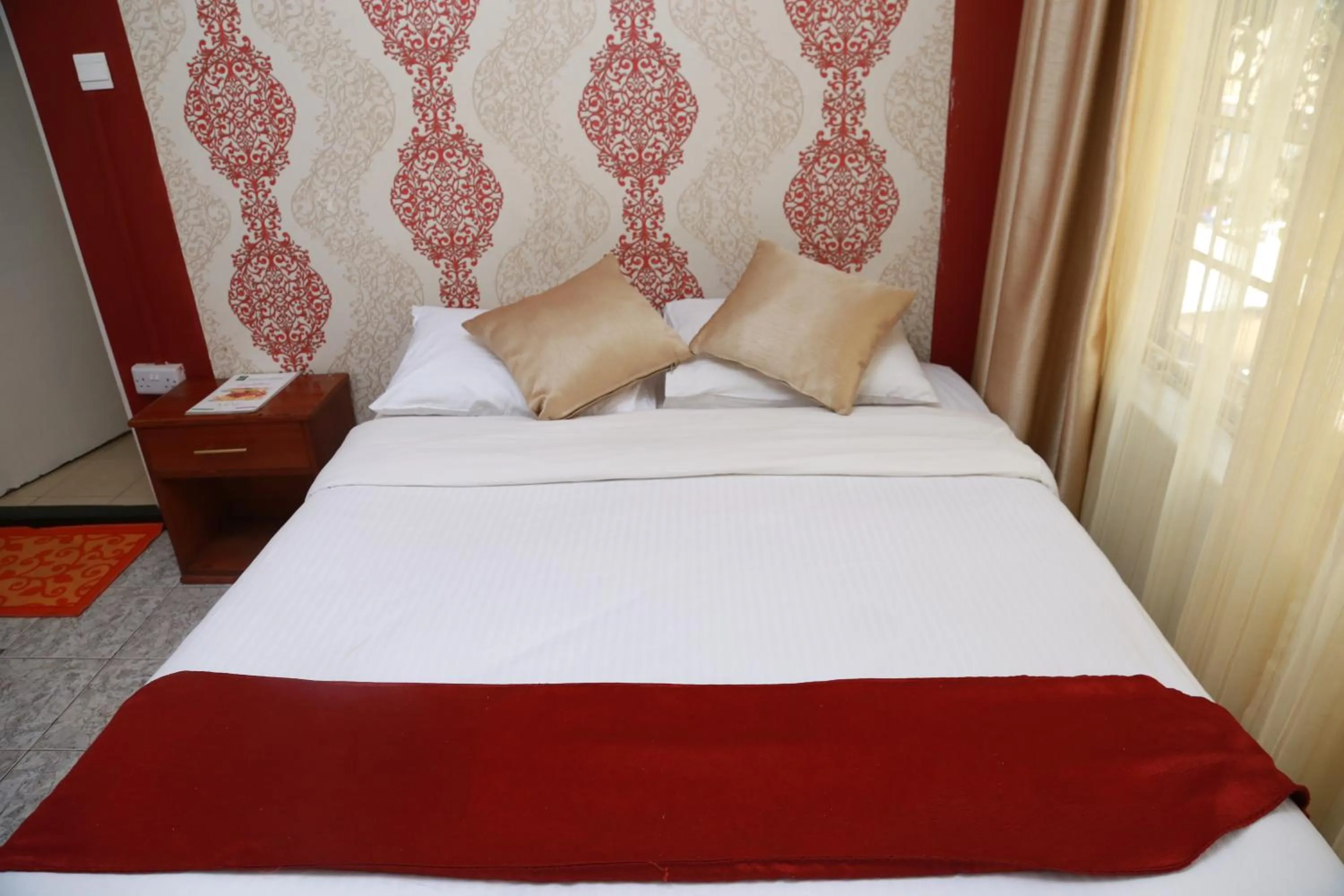 Bed in Hotel Embassy