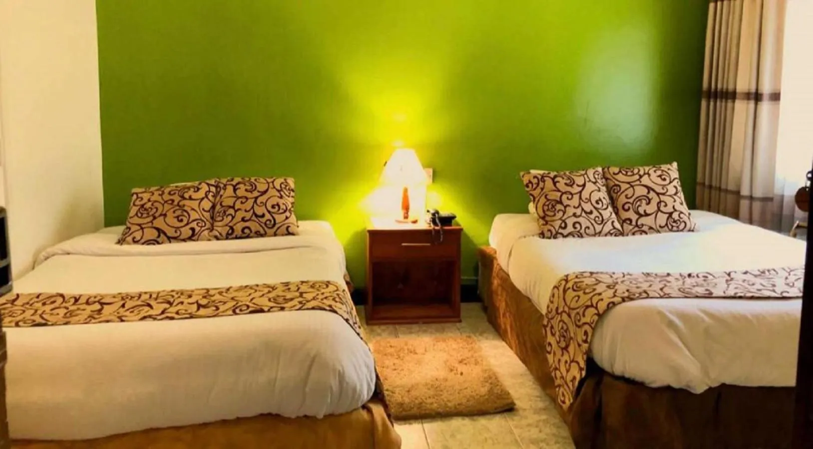 Bed in Hotel Embassy