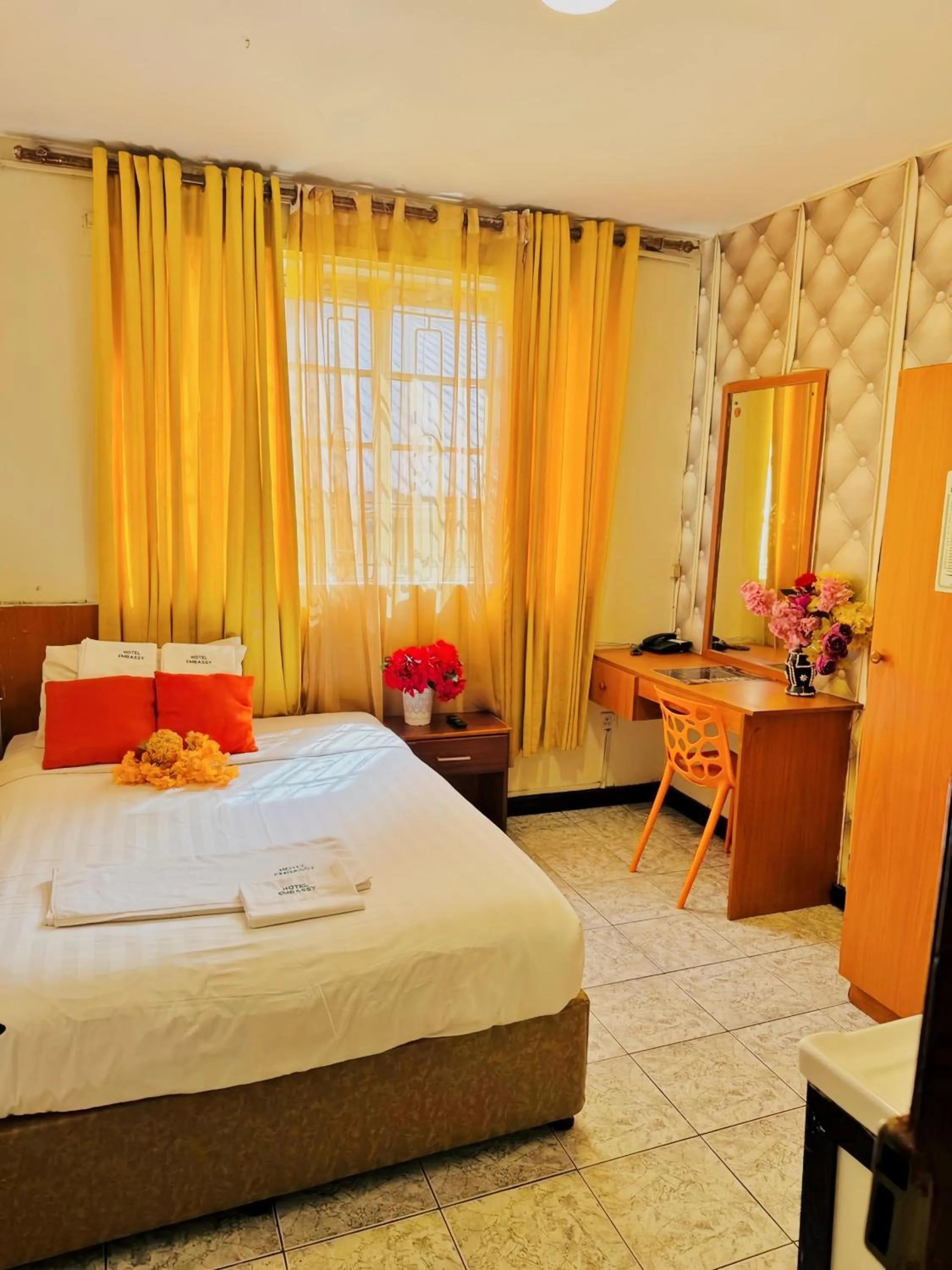 Bed in Hotel Embassy