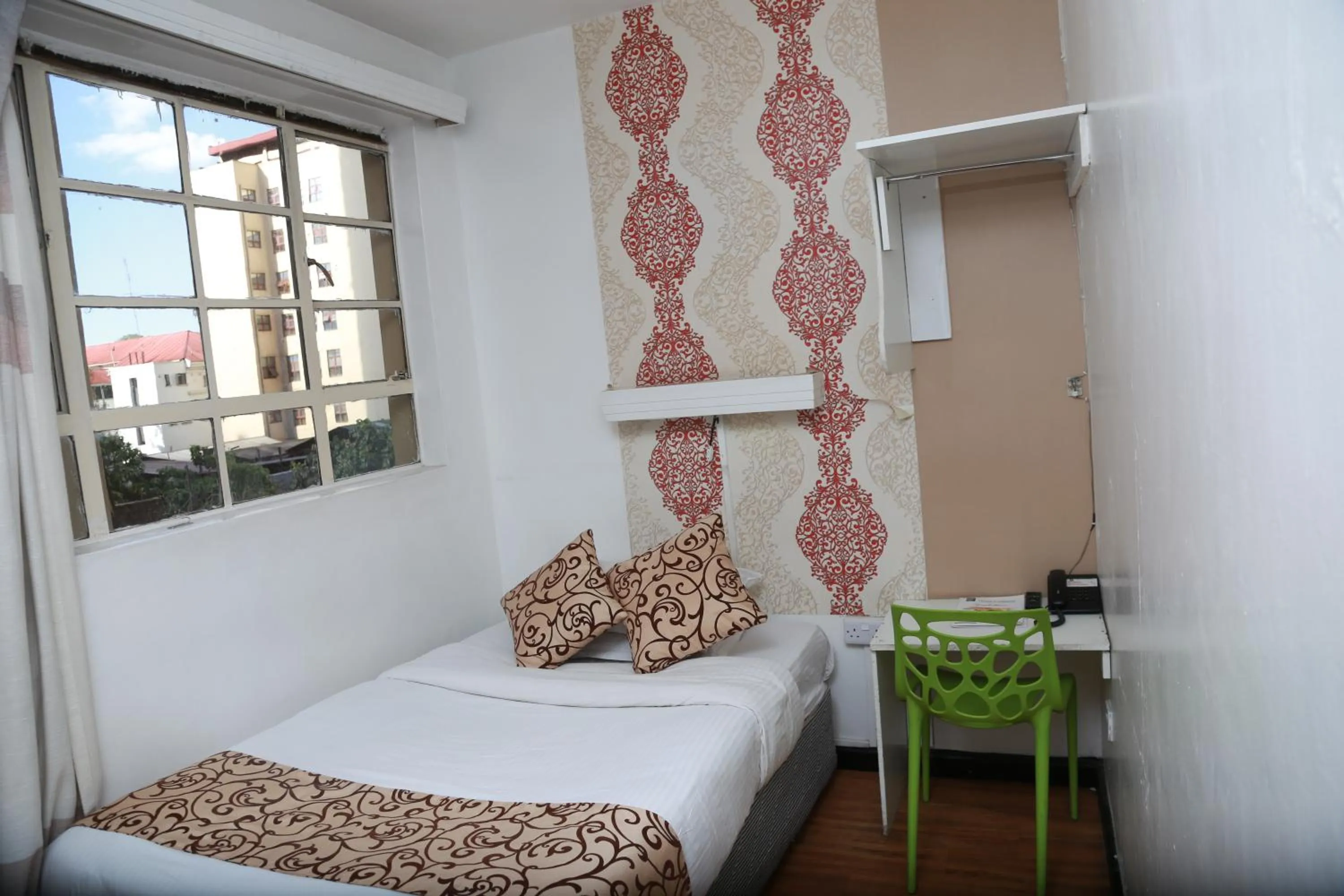 Bed in Hotel Embassy