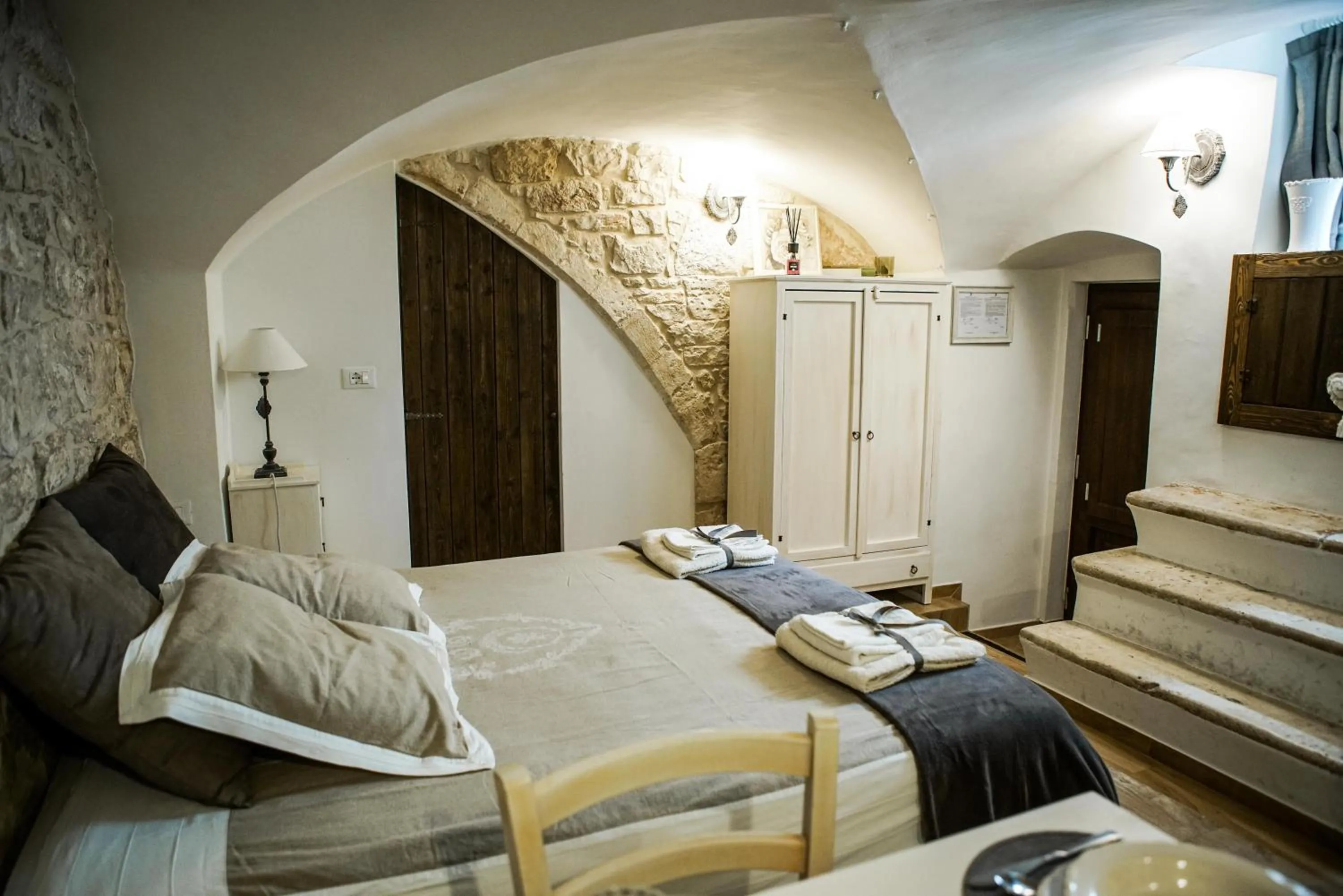 Bed in HOME 5 - Via Nuova